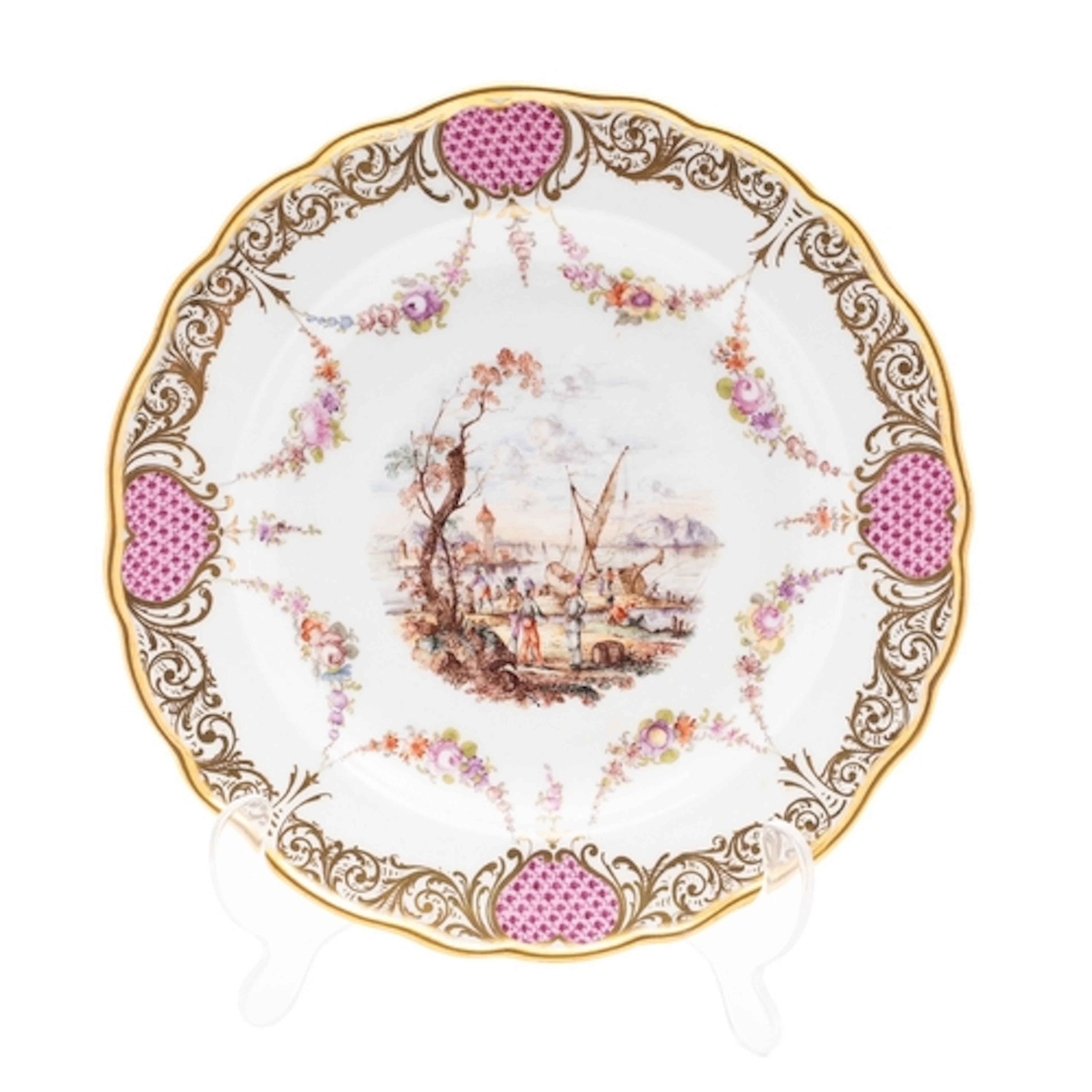 A Meissen porcelain plate painted with a busy harbour scene ...