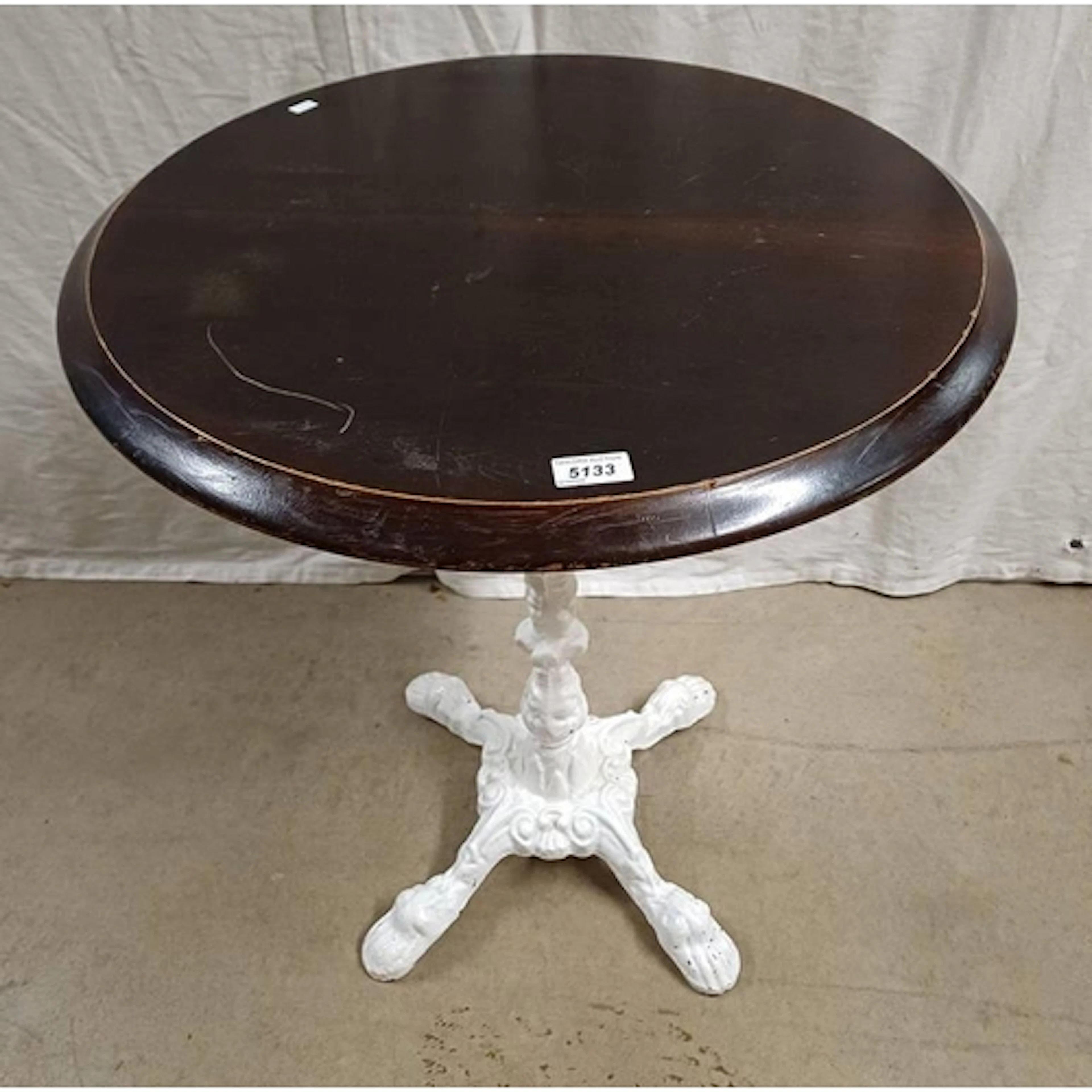 MAHOGANY CIRCULAR PUB TABLE ON PAINTED CAST IRON PEDESTAL WI...