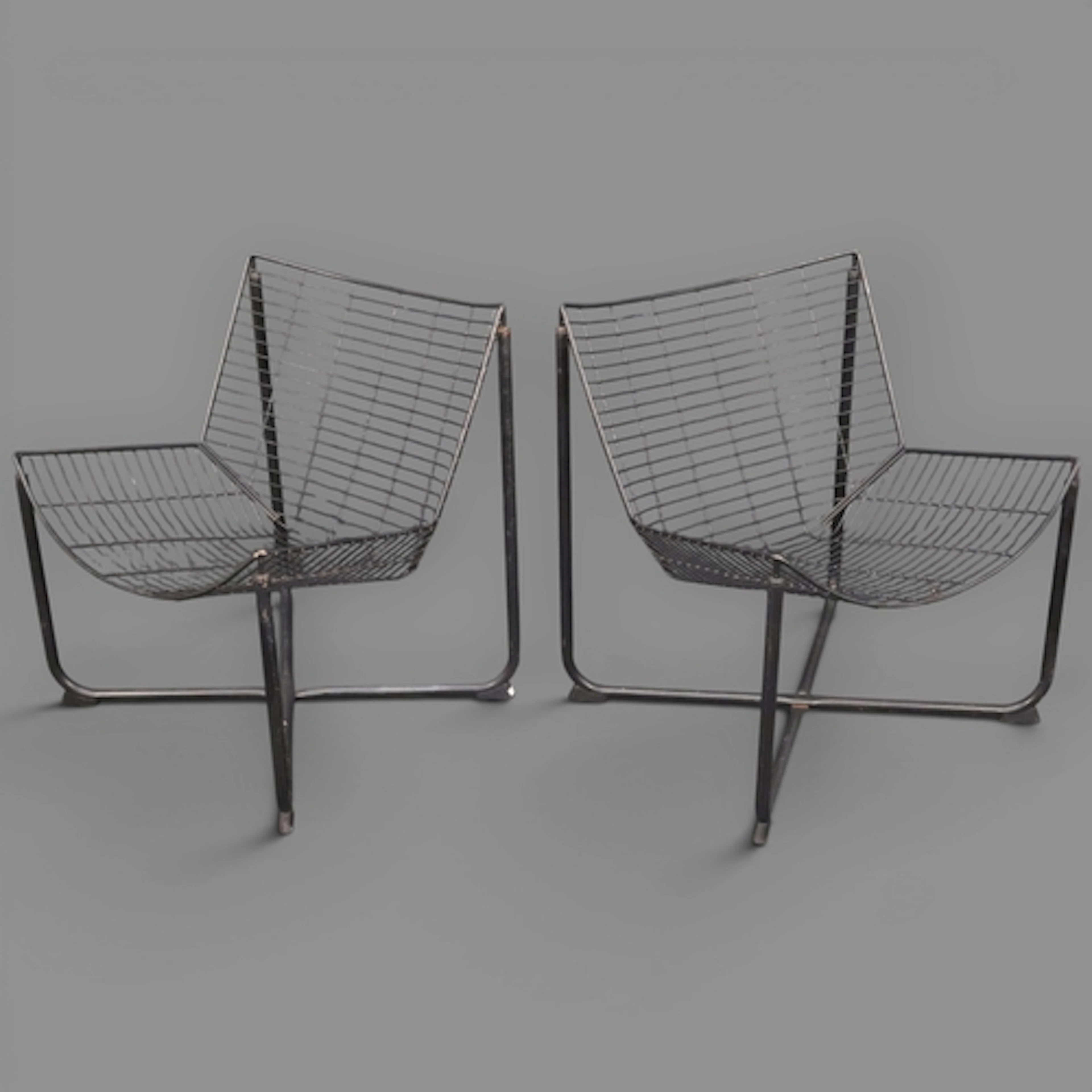A pair of Ikea Skalboda or Jarpen post-modern wire mesh loun...
