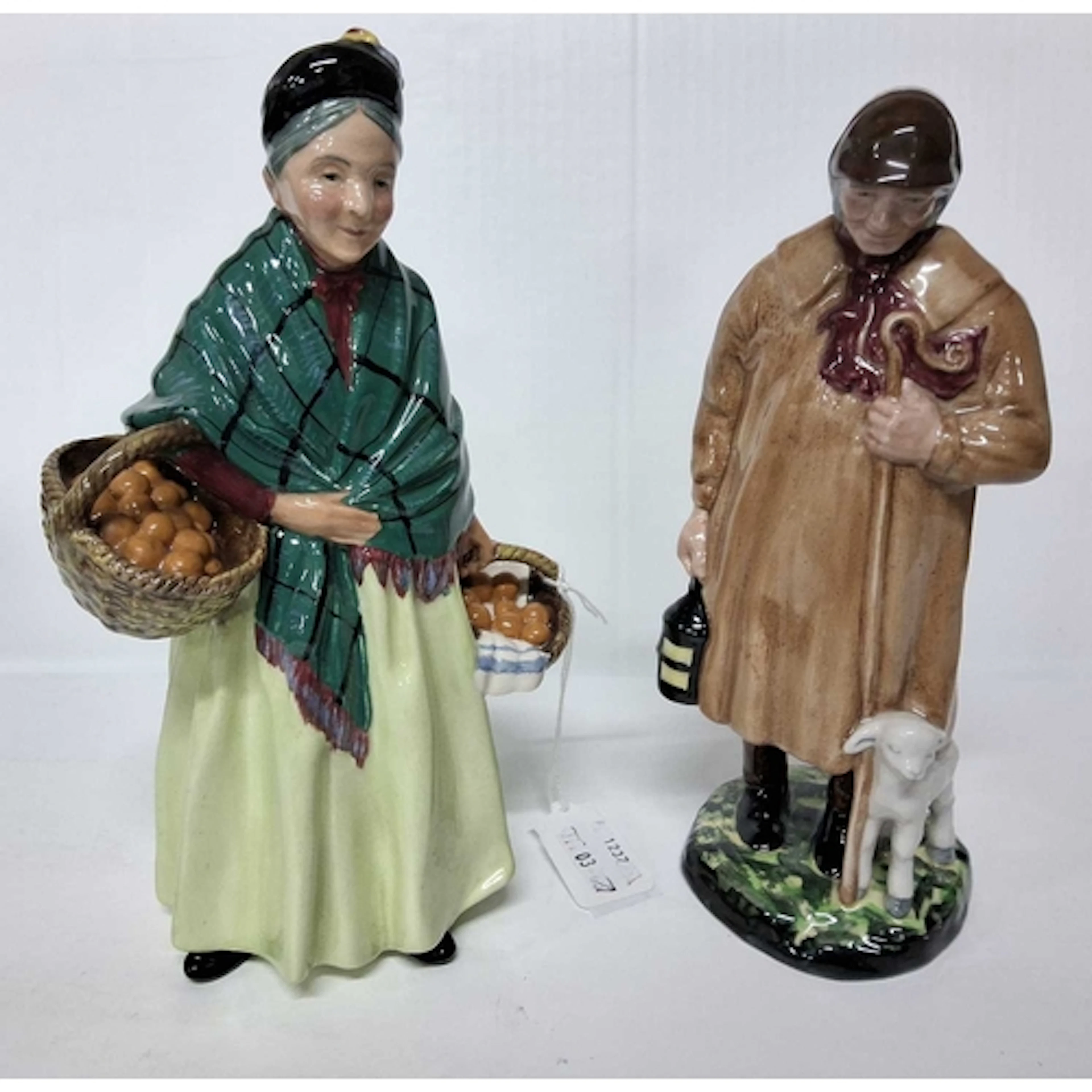 TWO ROYAL DOULTON FIGURES, comprising The Orange Lady HN1953...