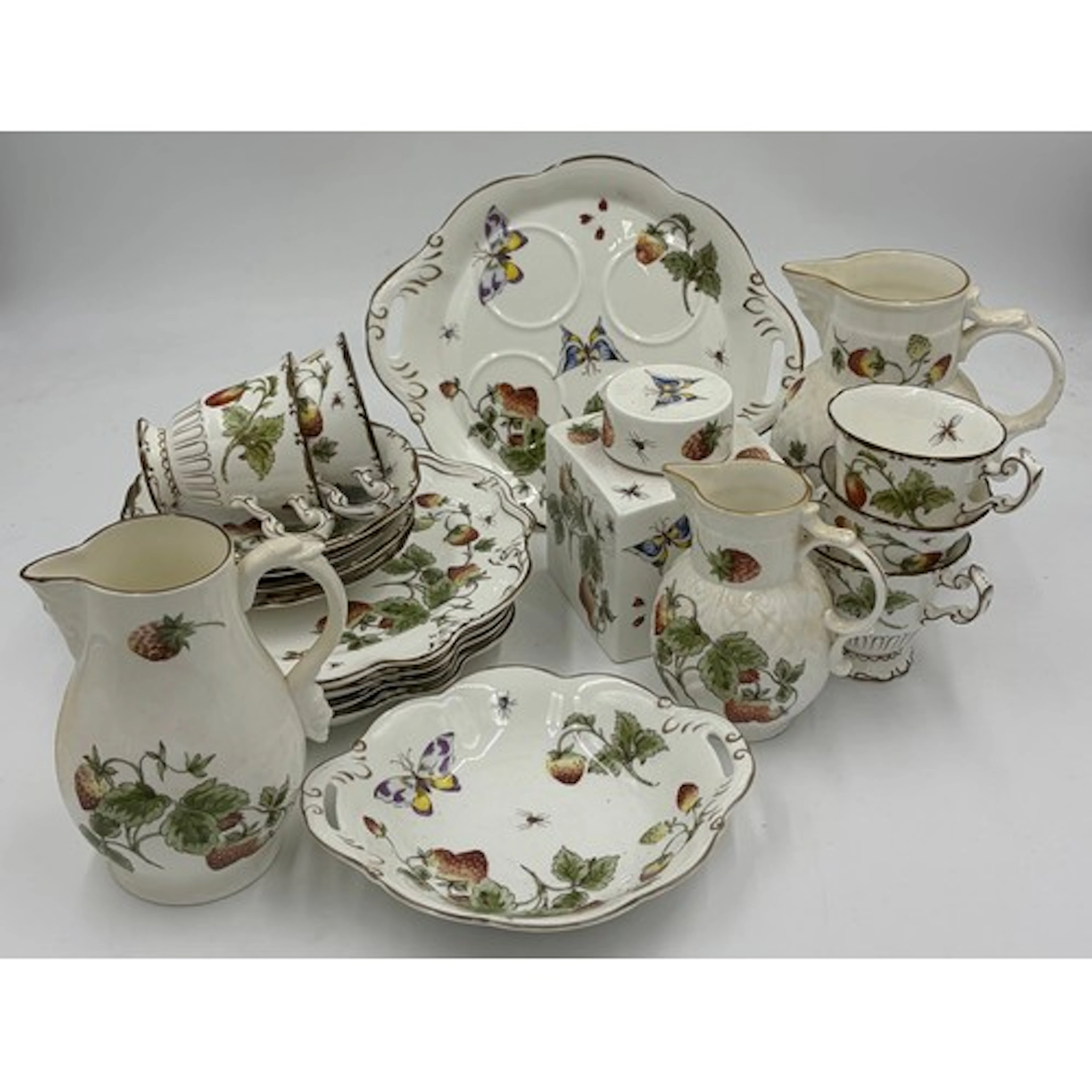 A collection of Coalport 'Strawberry' pattern tableware to i...