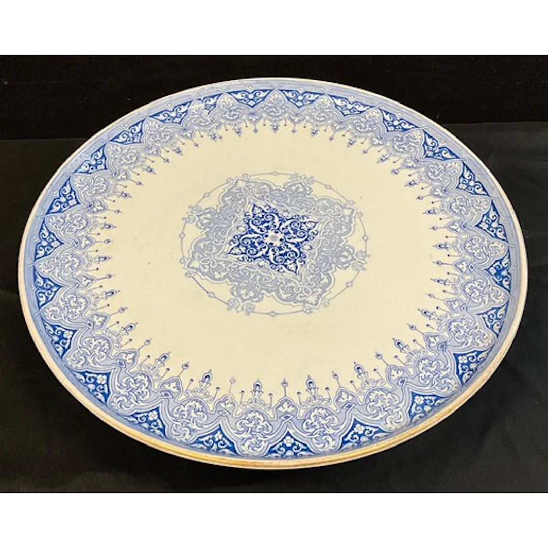 A blue and white transfer printed ceramic lazy Susan, gilt d...
