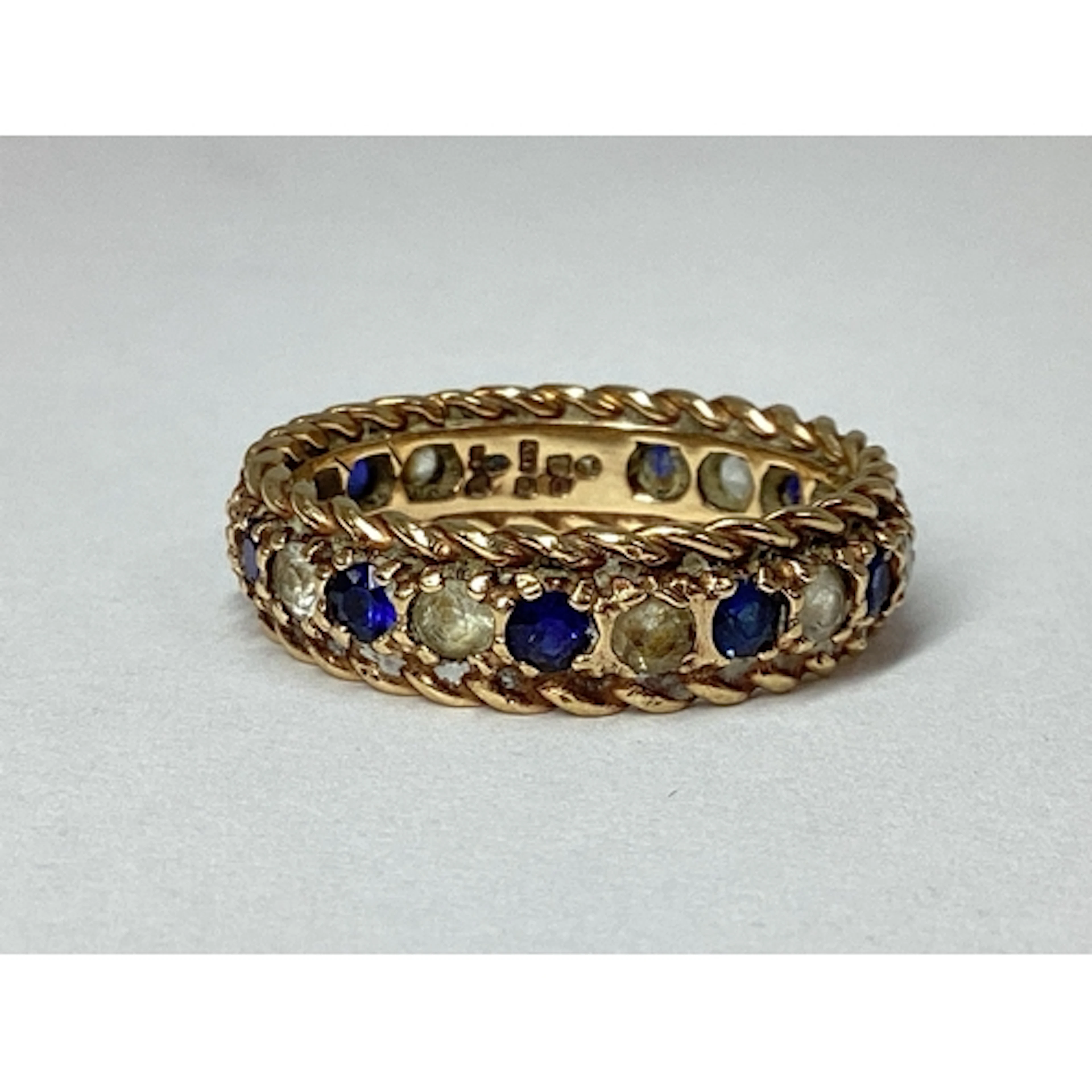 A Ropetwist Textured Full Eternity Style Ring, with alternat...