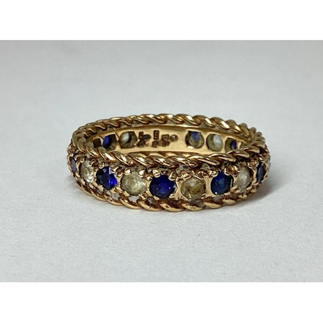 A Ropetwist Textured Full Eternity Style Ring, with alternat...