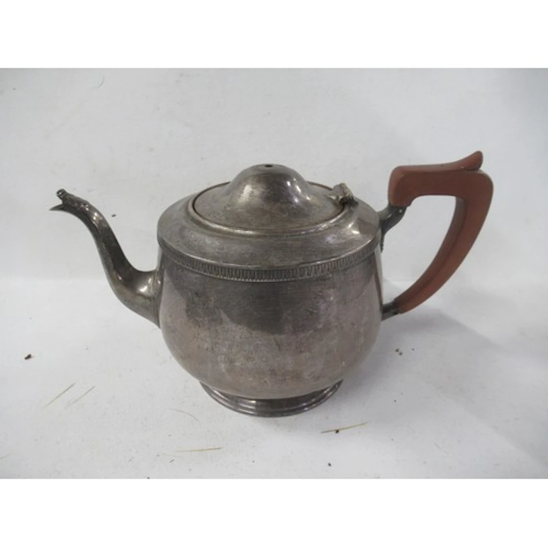 A silver tea pot, weight 17oz all in, together with a silver...
