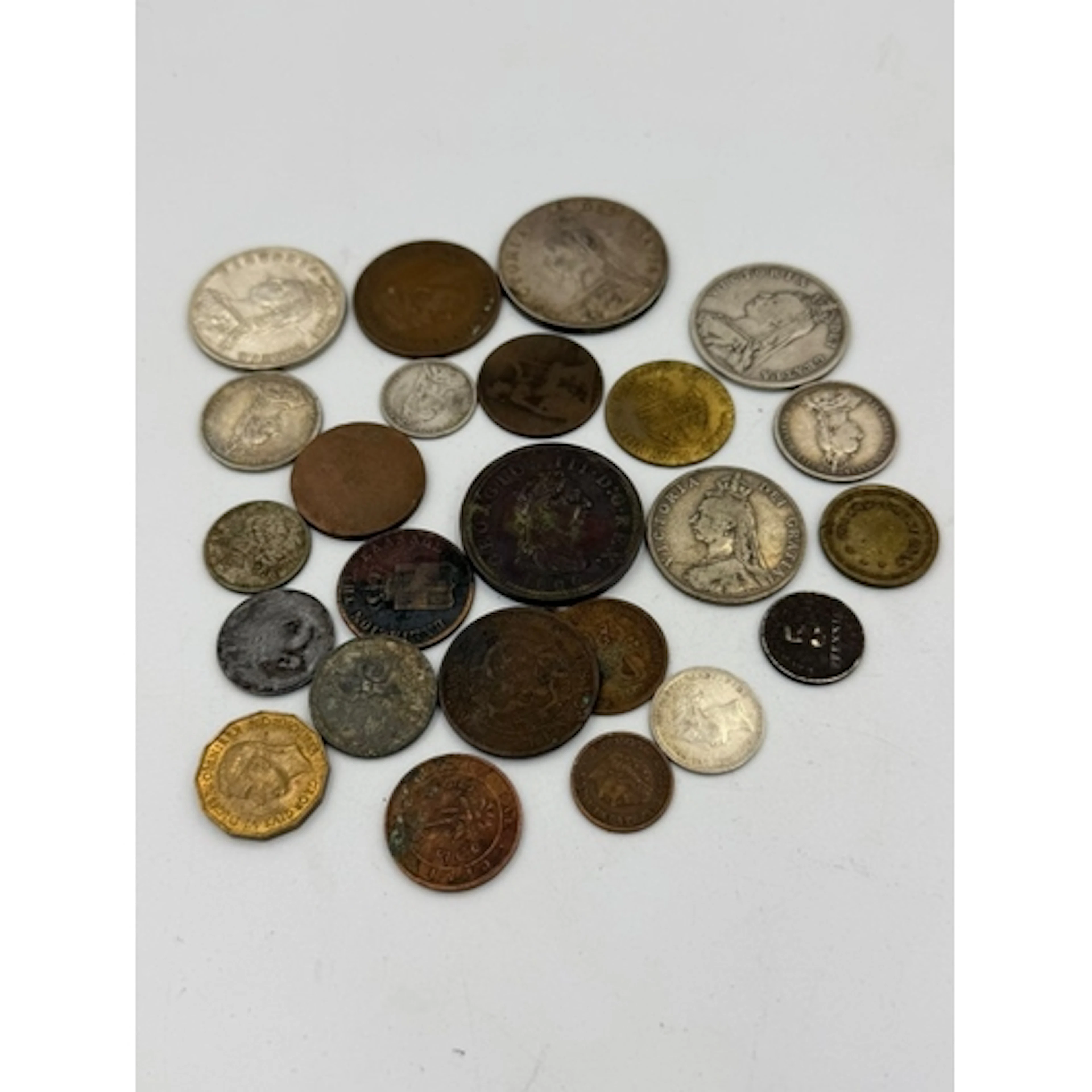 A selection of worldwide coins to include British Victorian....