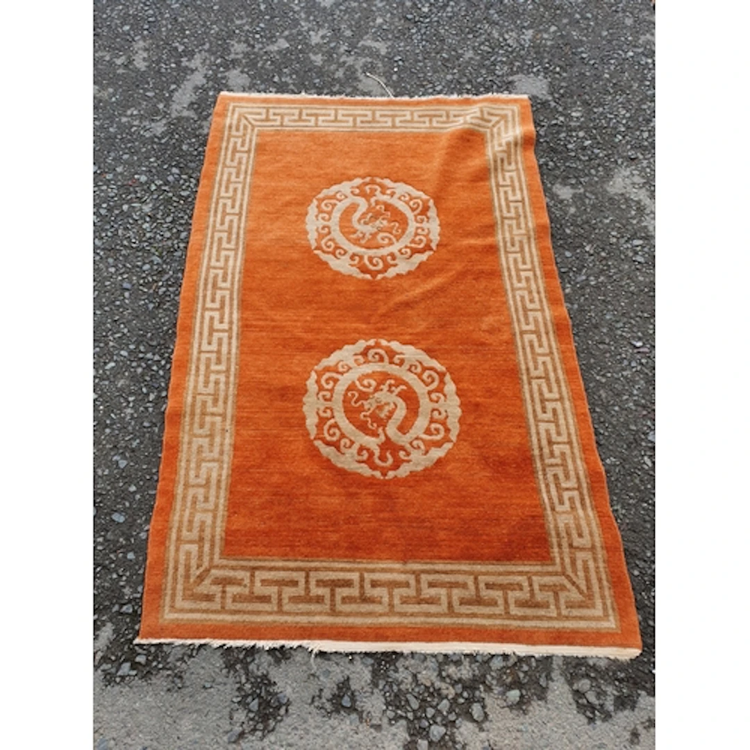 A Chinese style wool Rug with geometric boarder and pair of ...