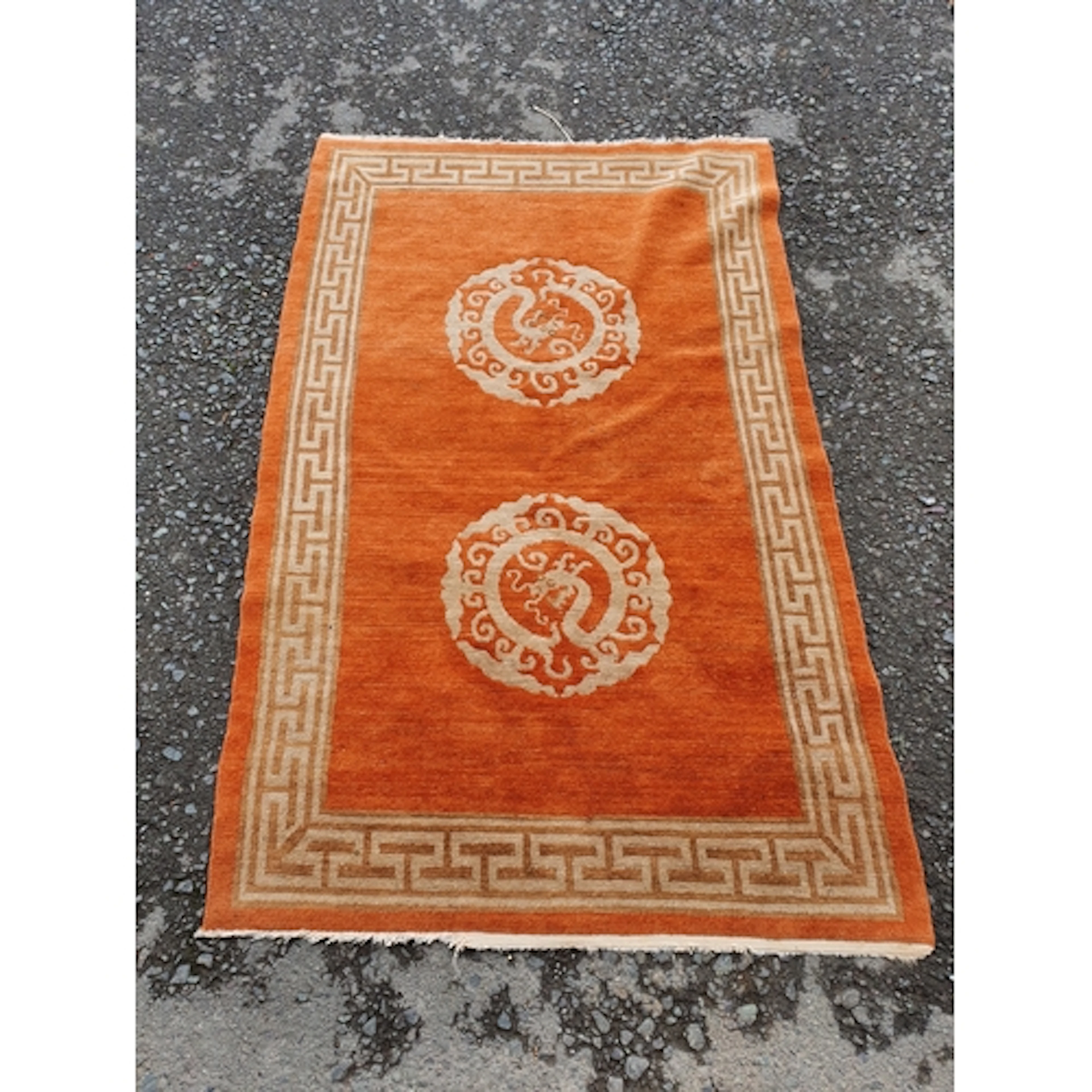 A Chinese style wool Rug with geometric boarder and pair of ...