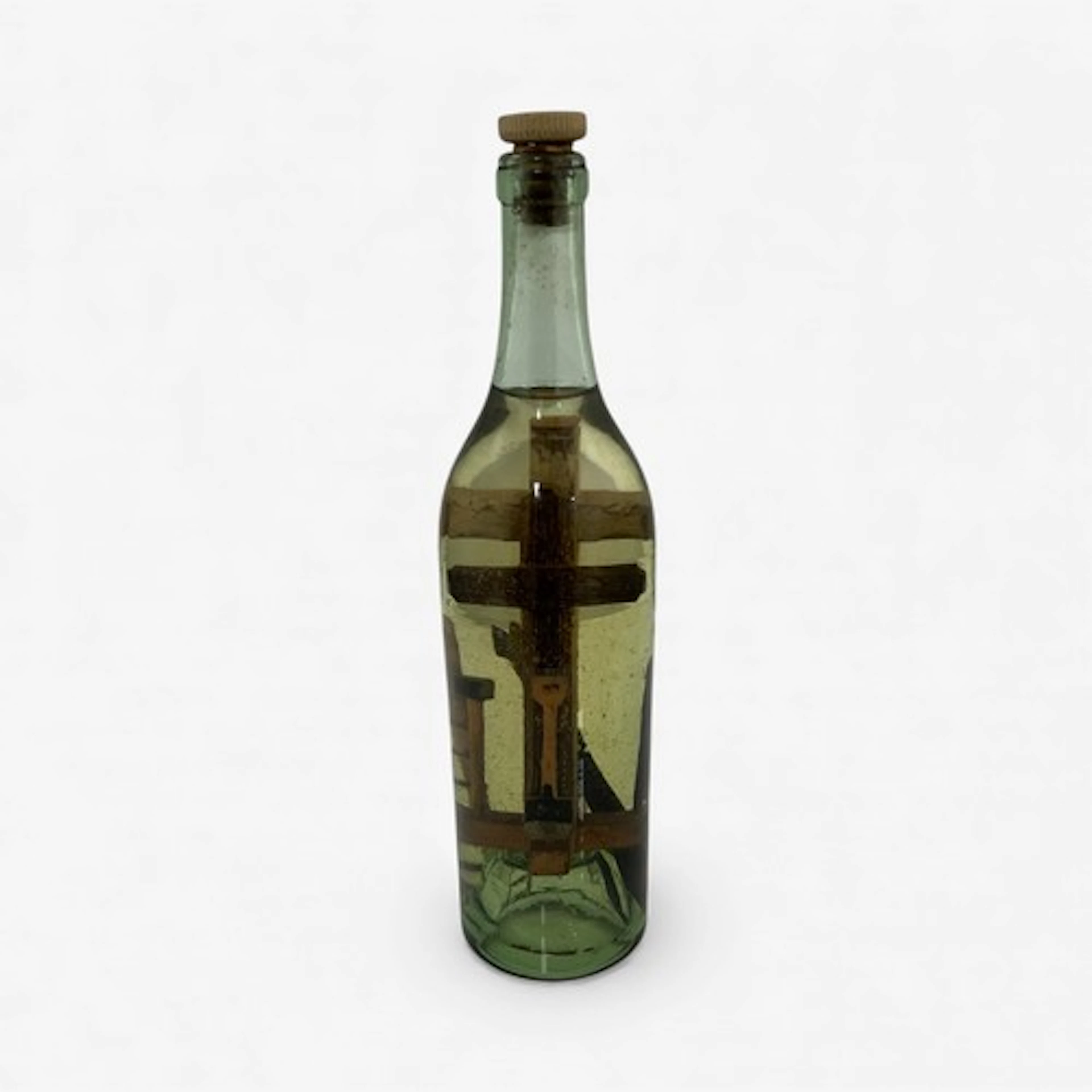An unusual Irish folk art “God in a Bottle”, green tinged gl...
