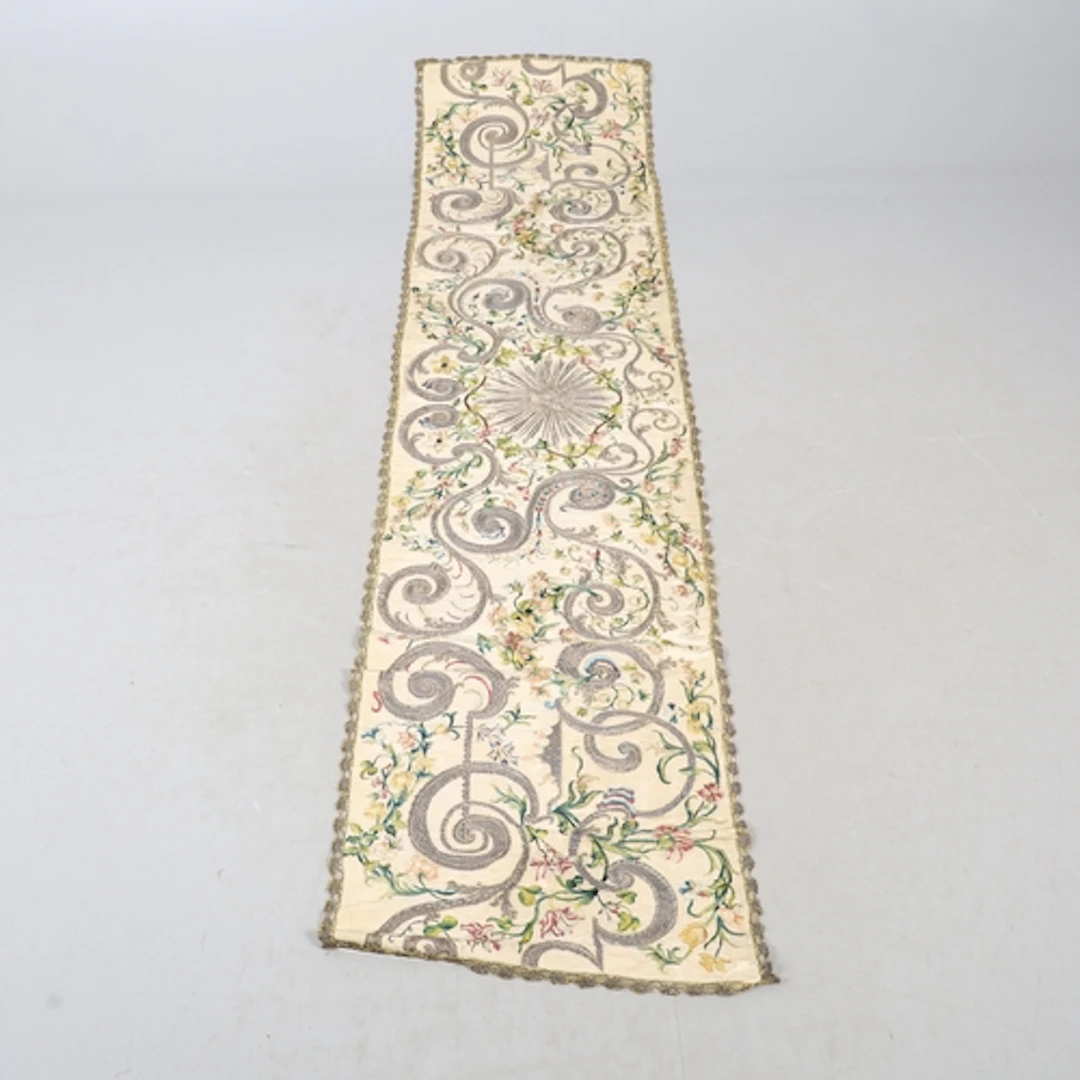 AN 18TH CENTURY SILK EMBROIDERY. possibly ecclesiastical, wo...