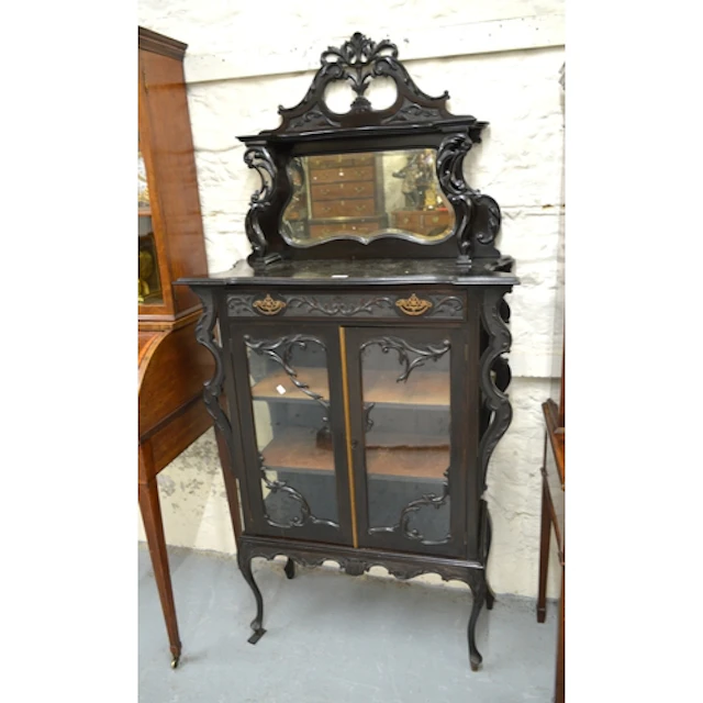 Edwardian ebonised display cabinet, the shaped pierced mirro...