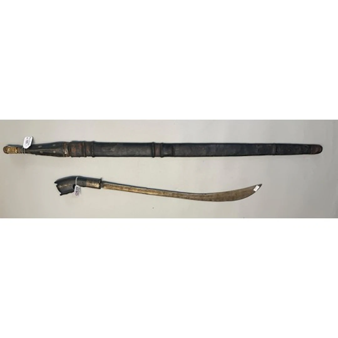 Two swords, comprising an Omani Kattara with long double-edg...