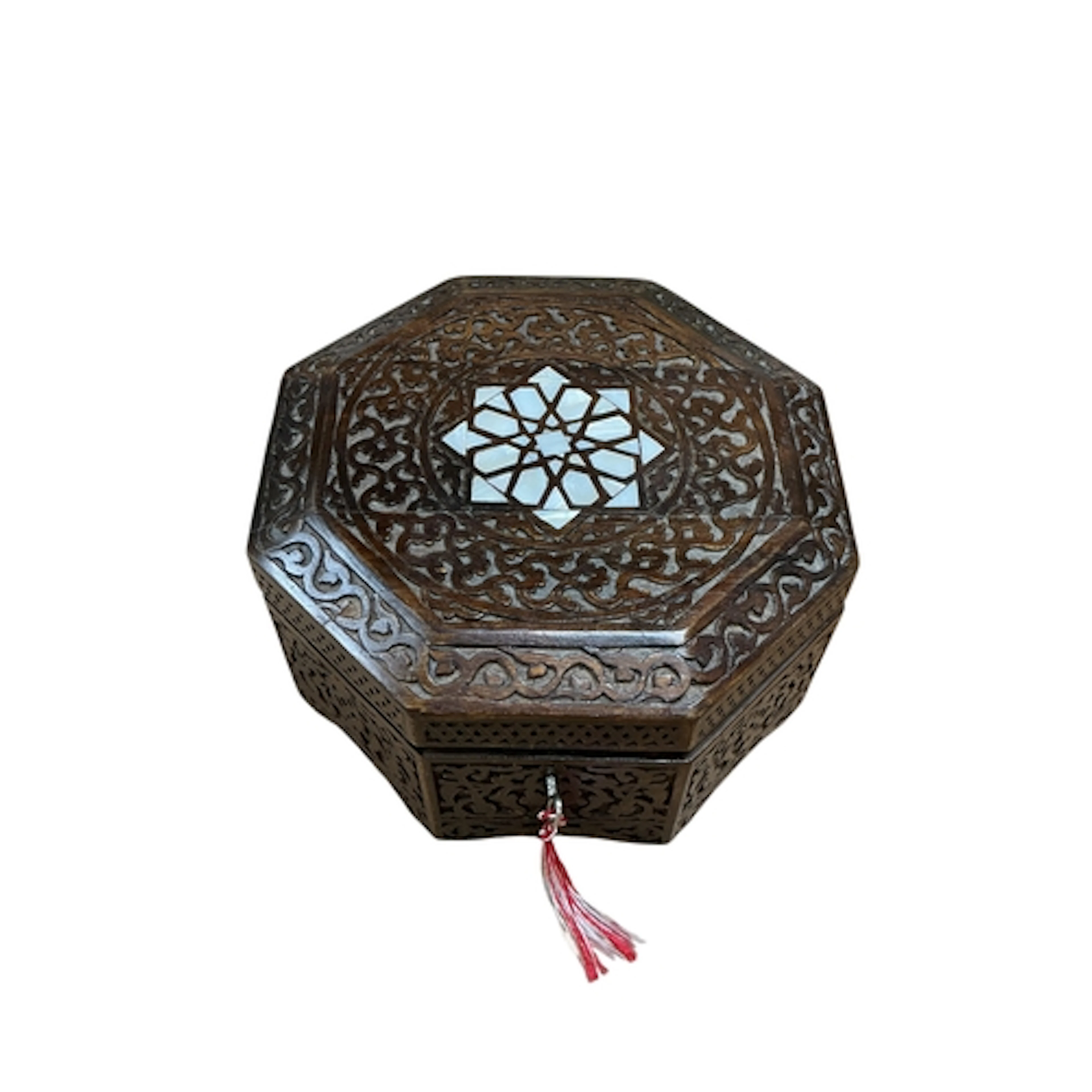 A Moroccan octagonal wooden box, inlaid with mother-of-pearl...