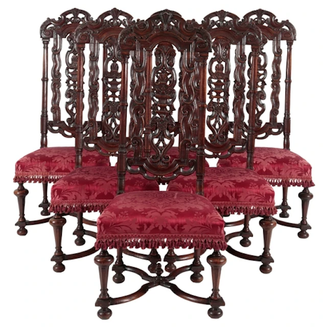 A set of six William & Mary walnut high back chairs in the m...