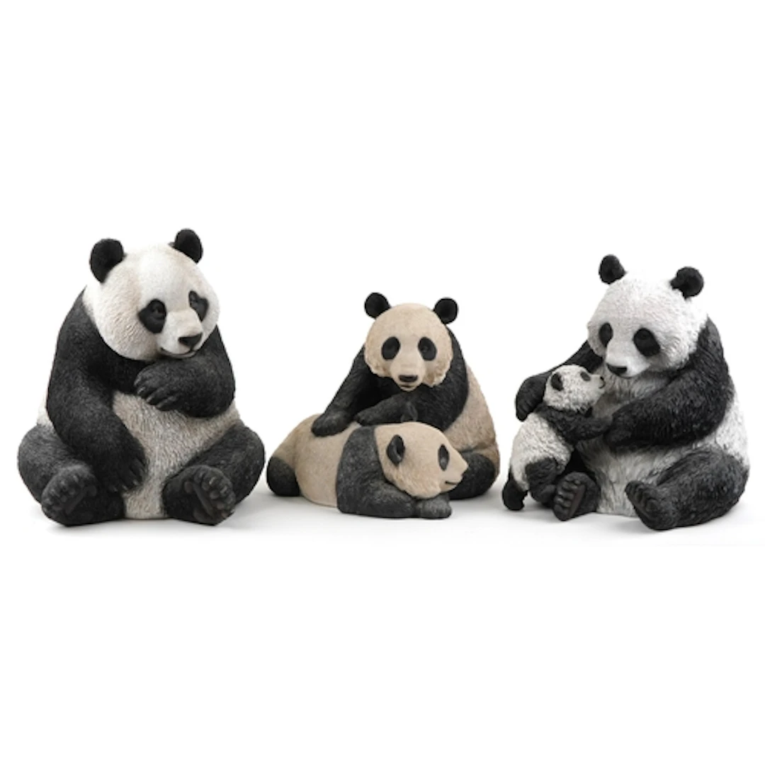 Three large composite model panda bears, the largest 54cm hi...