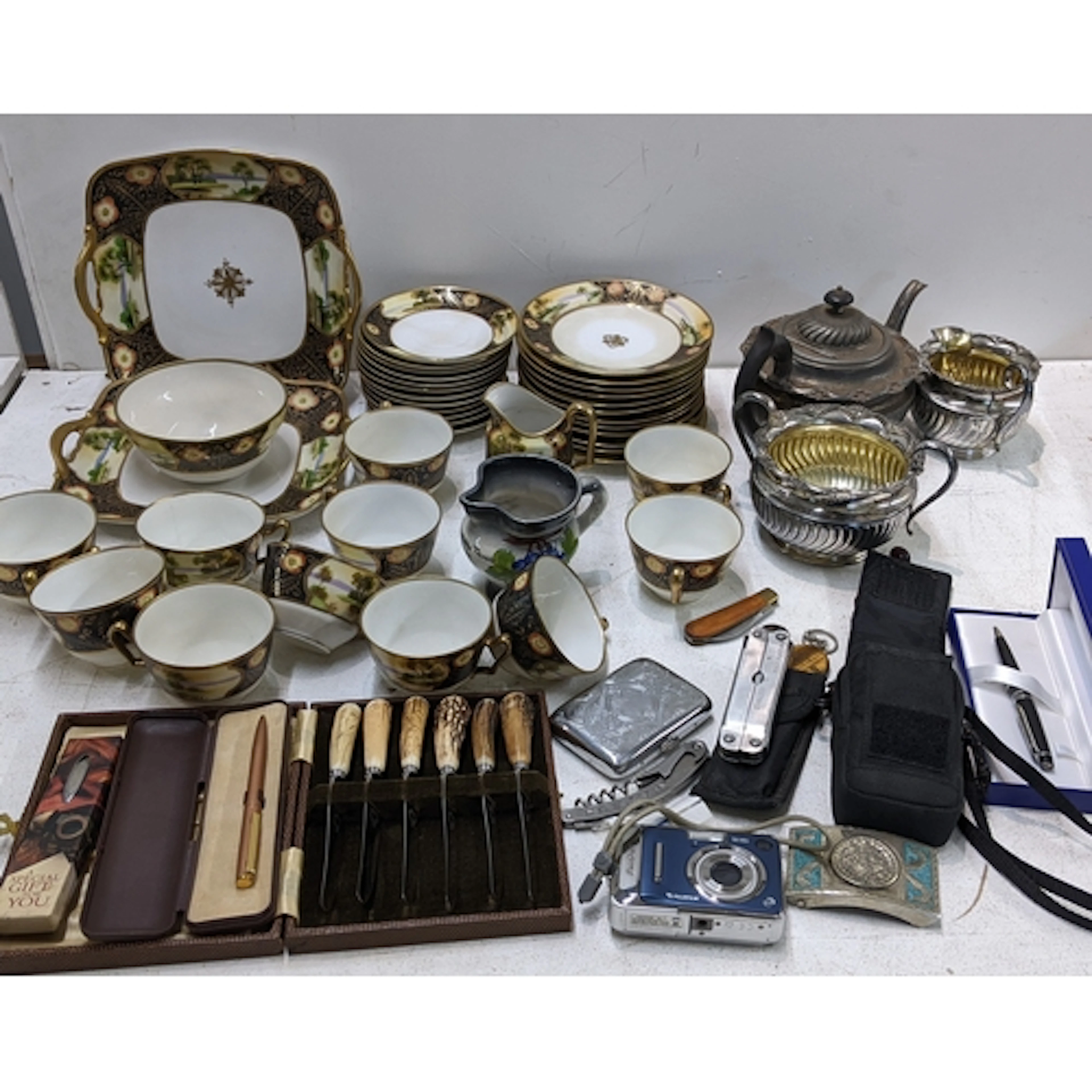 A mixed lot to include a silver plated tea set, Fujifilm dig...