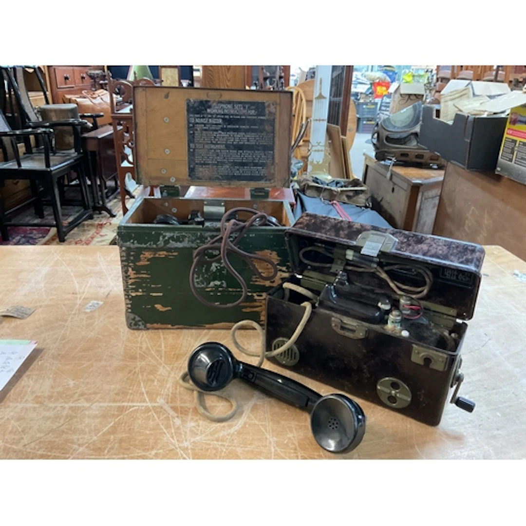 Two military field telephones.