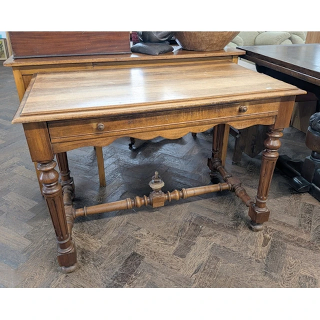 An early 20th century mahogany hall table on reeded legs wit...