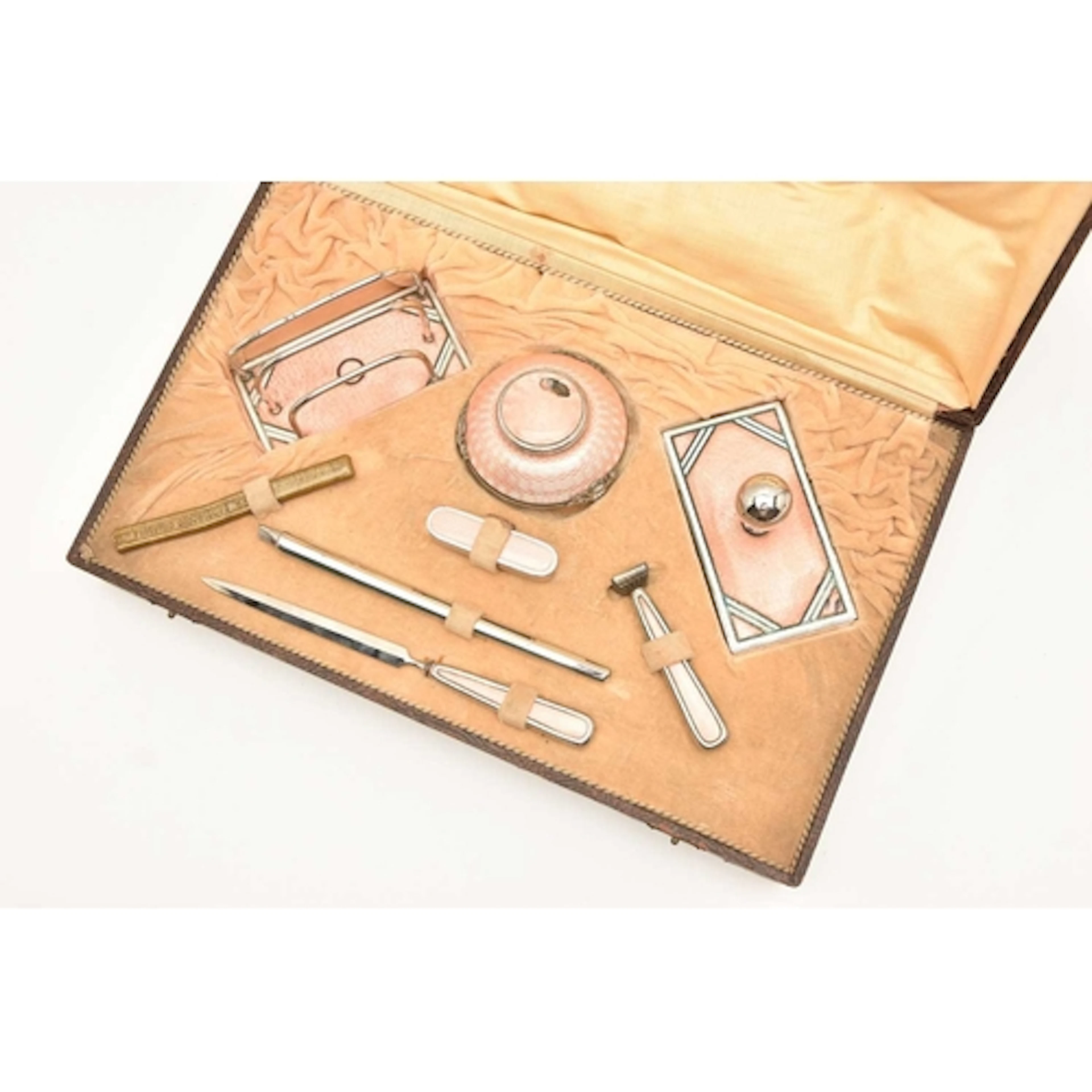 CASED ART DECO TRAVELLING DESK SET, base metal set with ligh...