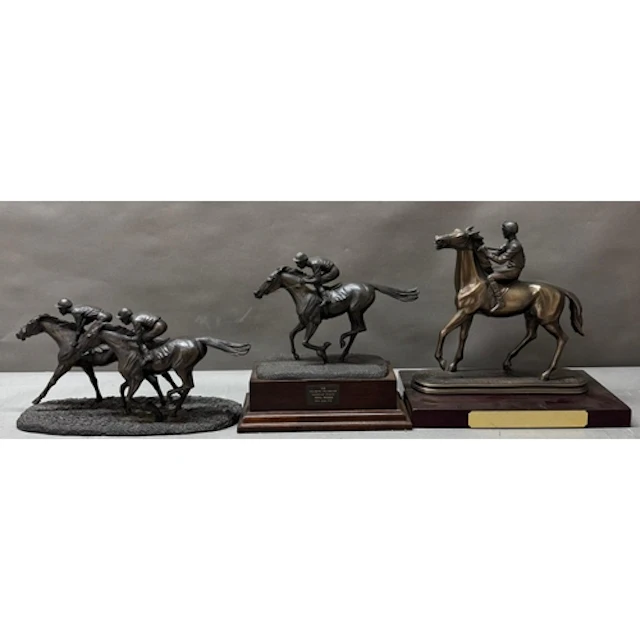 Horse racing interest. Three horse racing trophies to includ...