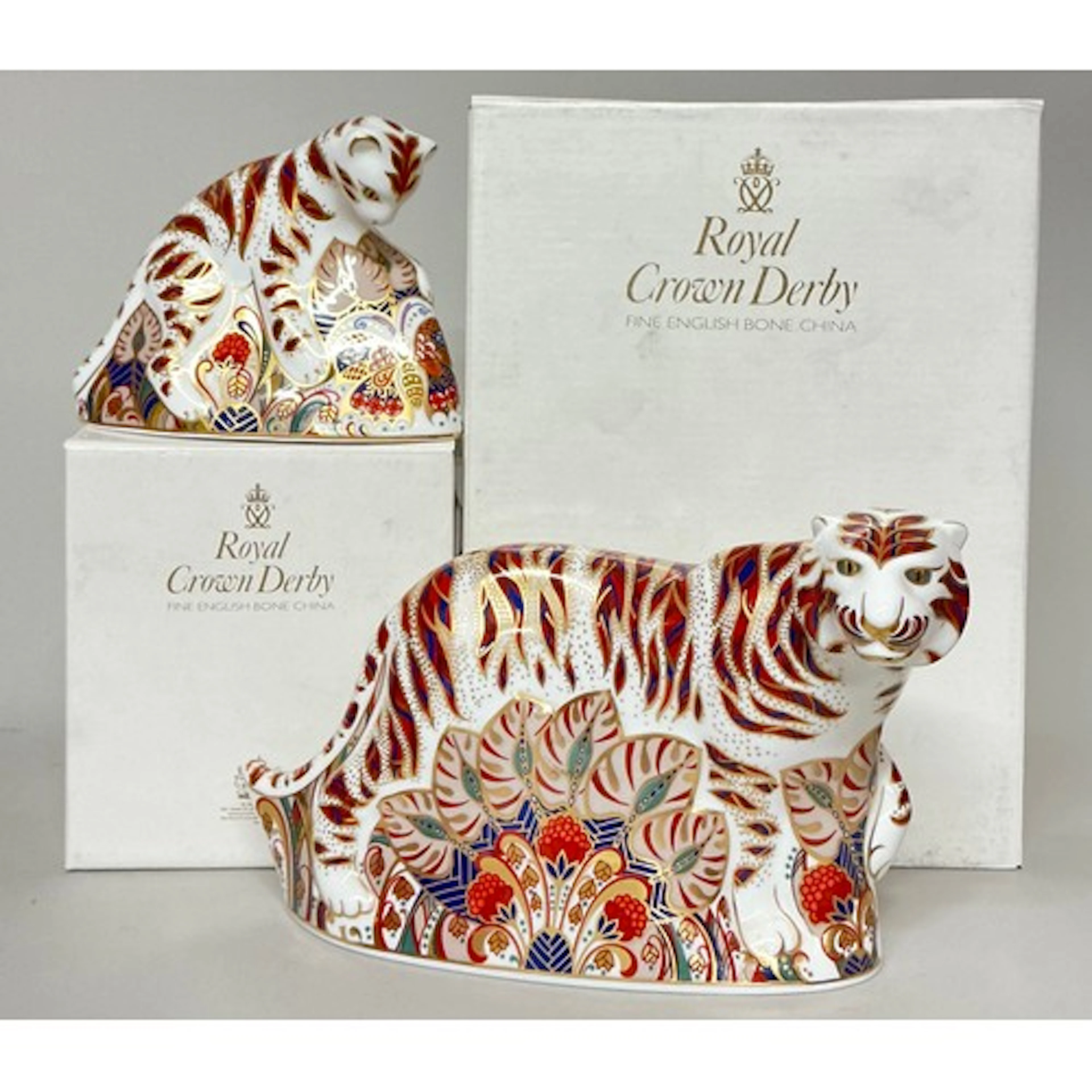 A Royal Crown Derby paperweight, Bengal Tiger, gold stopper,...