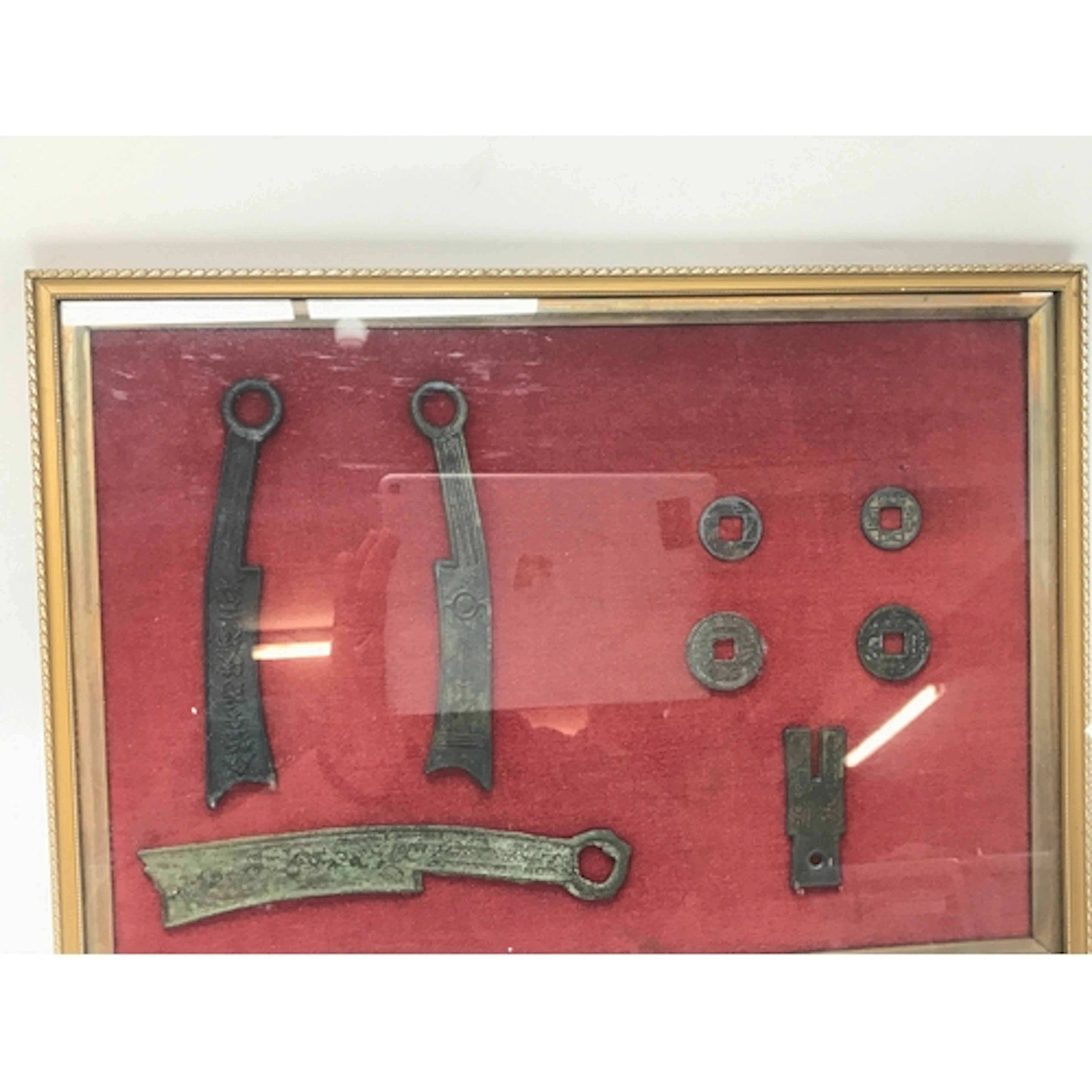 Framed collection appears to display ancient Chinese bronze ...