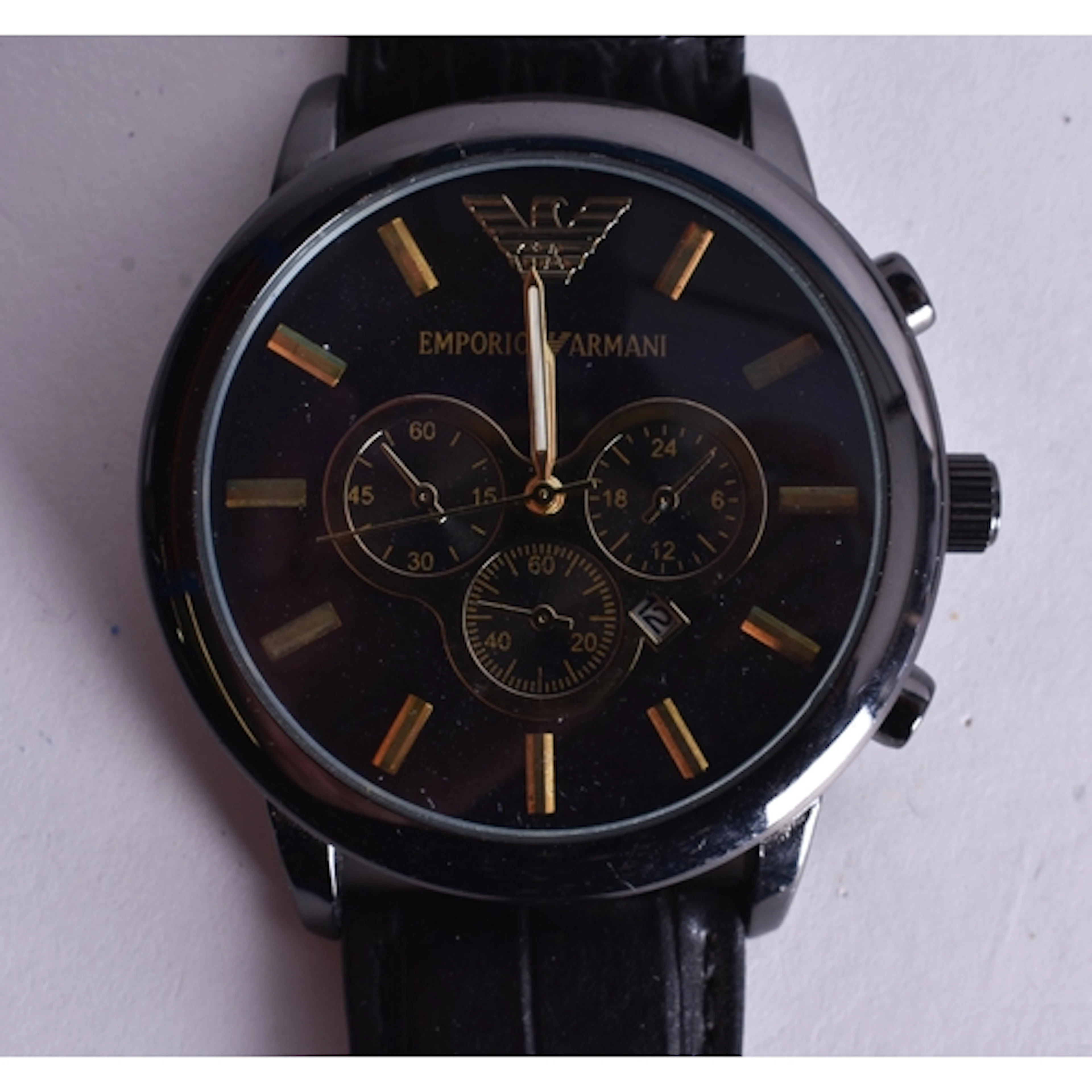 AN ARMANI WATCH. Untested. 5 cm wide.