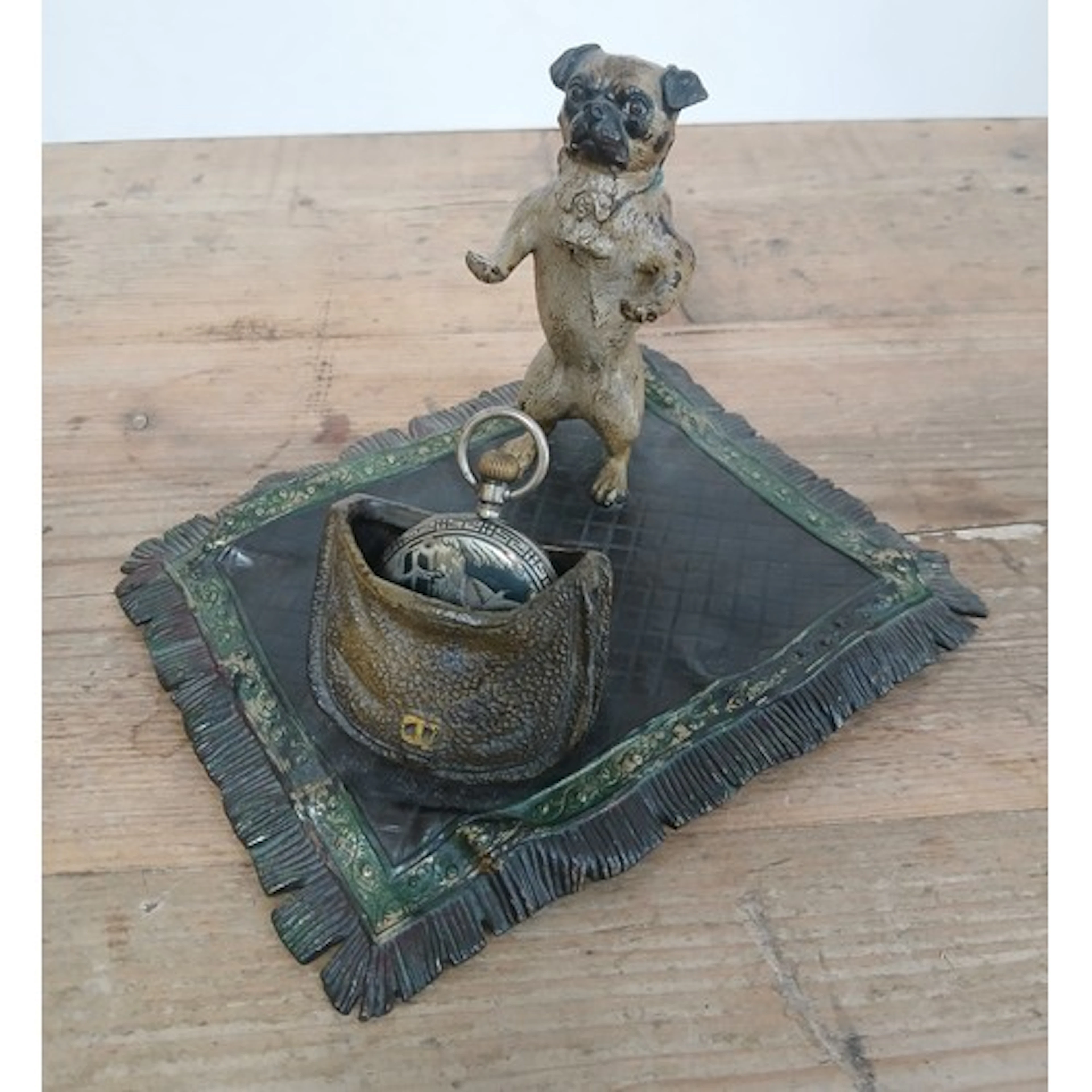 A patinated bronze pocket watch stand by Franz Xavier Bergma...