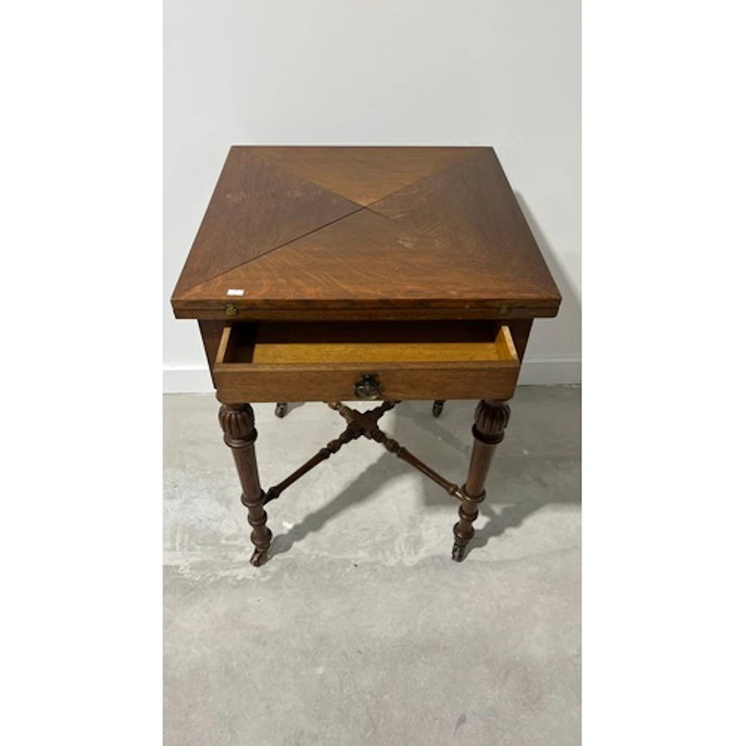 Envelope card table, raised on baluster turned legs terminat...