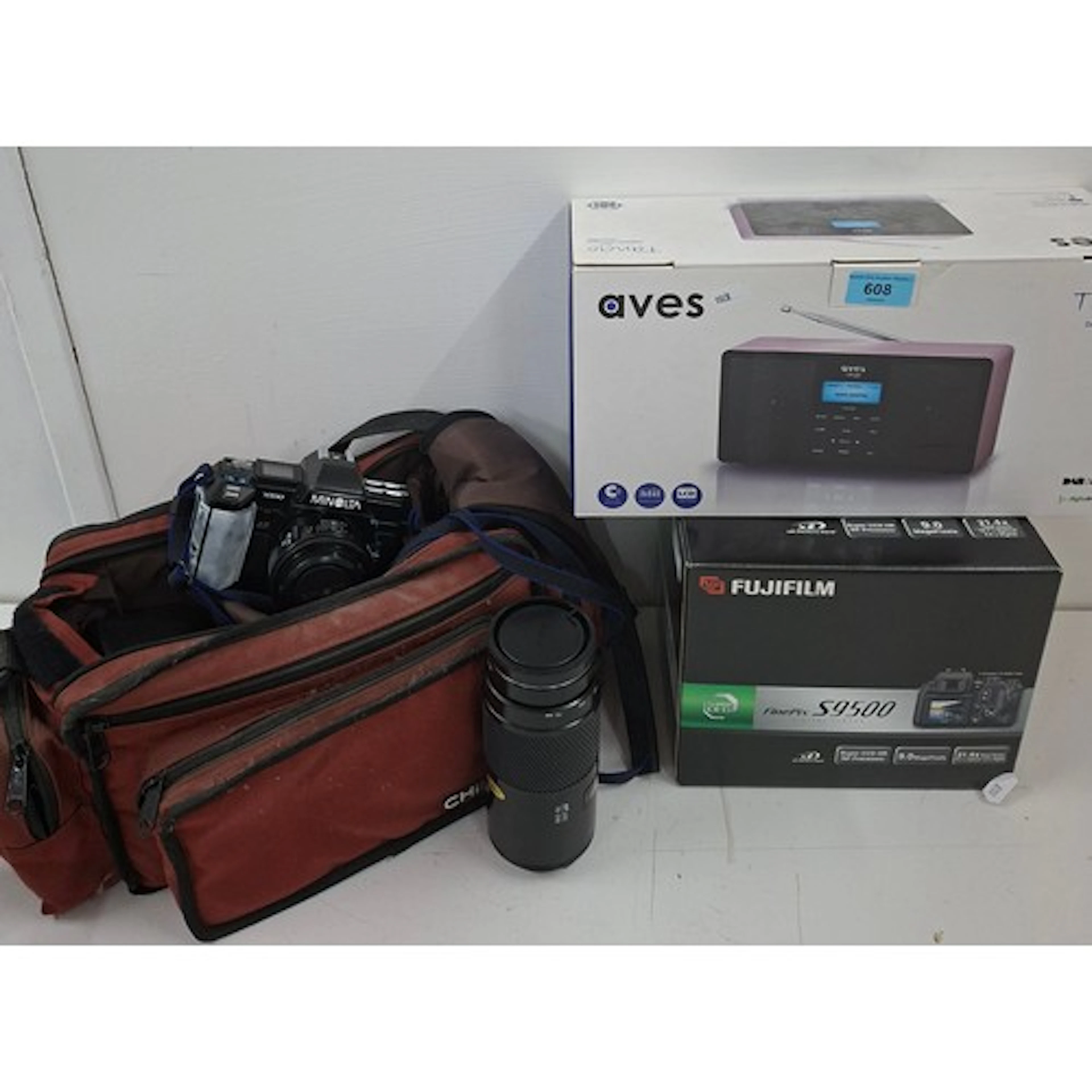 A Minolta 7000 camera an accessories, a boxed Fujifilm FineP...