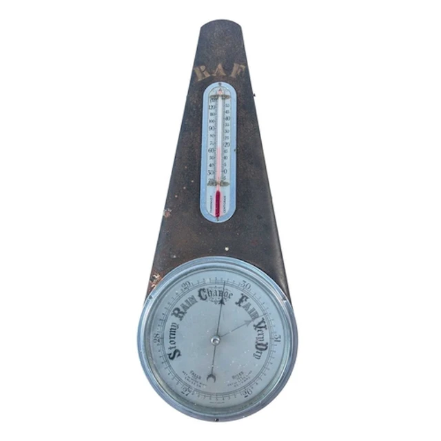 A vintage combination weather station instrument with hand p...
