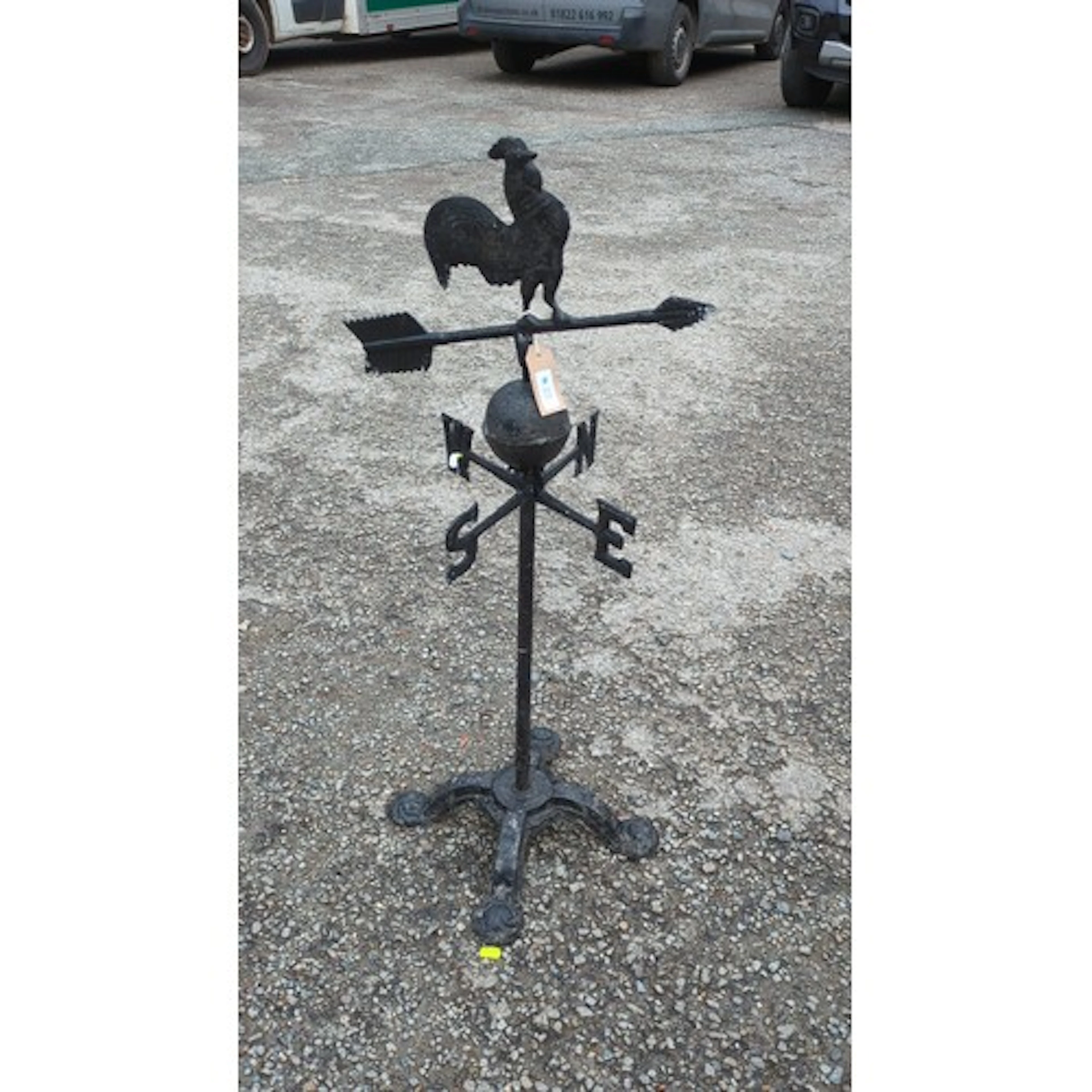Cast-iron garden weathervane, surmounted by a cockerel over ...