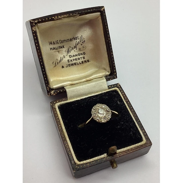 An Antique Diamond Cluster Ring, oval form, claw set with ol...