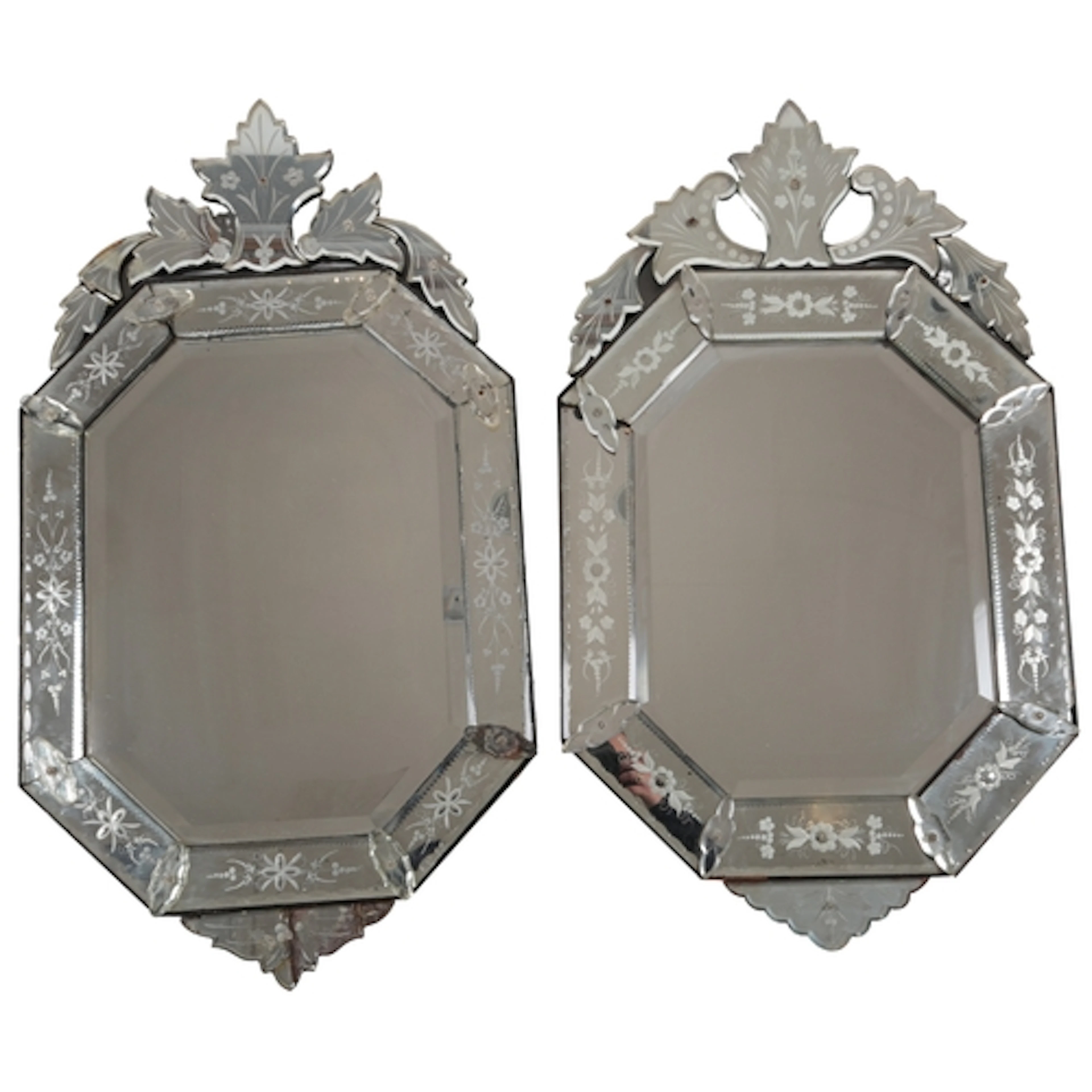 A near pair of Venetian etched and cut glass wall mirrors, e...