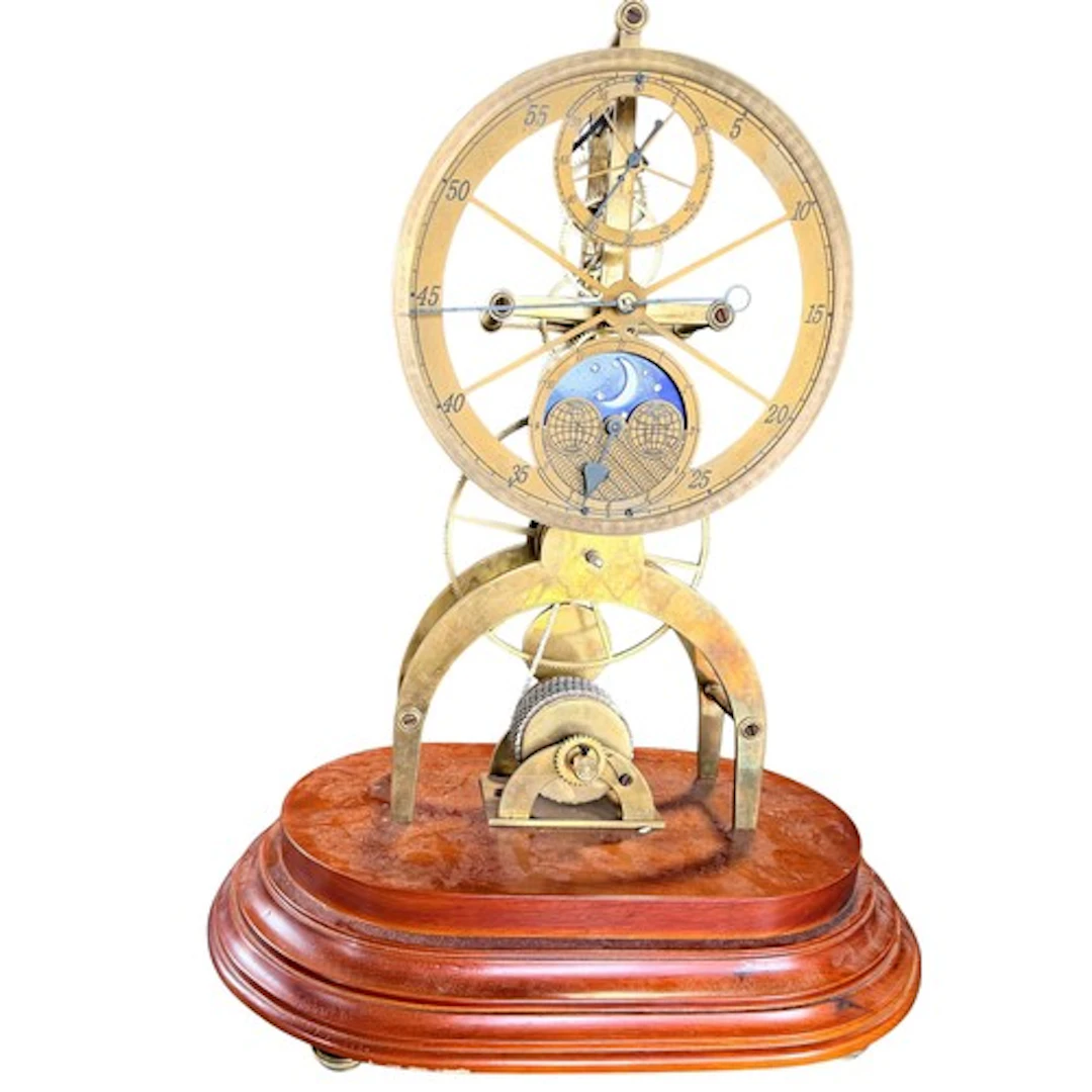 A large 20th century brass astronomical dial skeleton clock,...