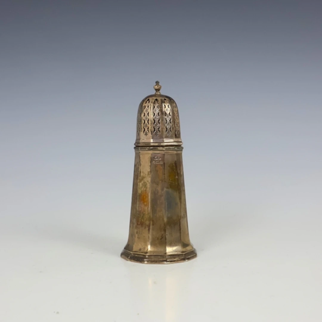 A George V silver sugar caster, William Suckling Ltd, Birmin...