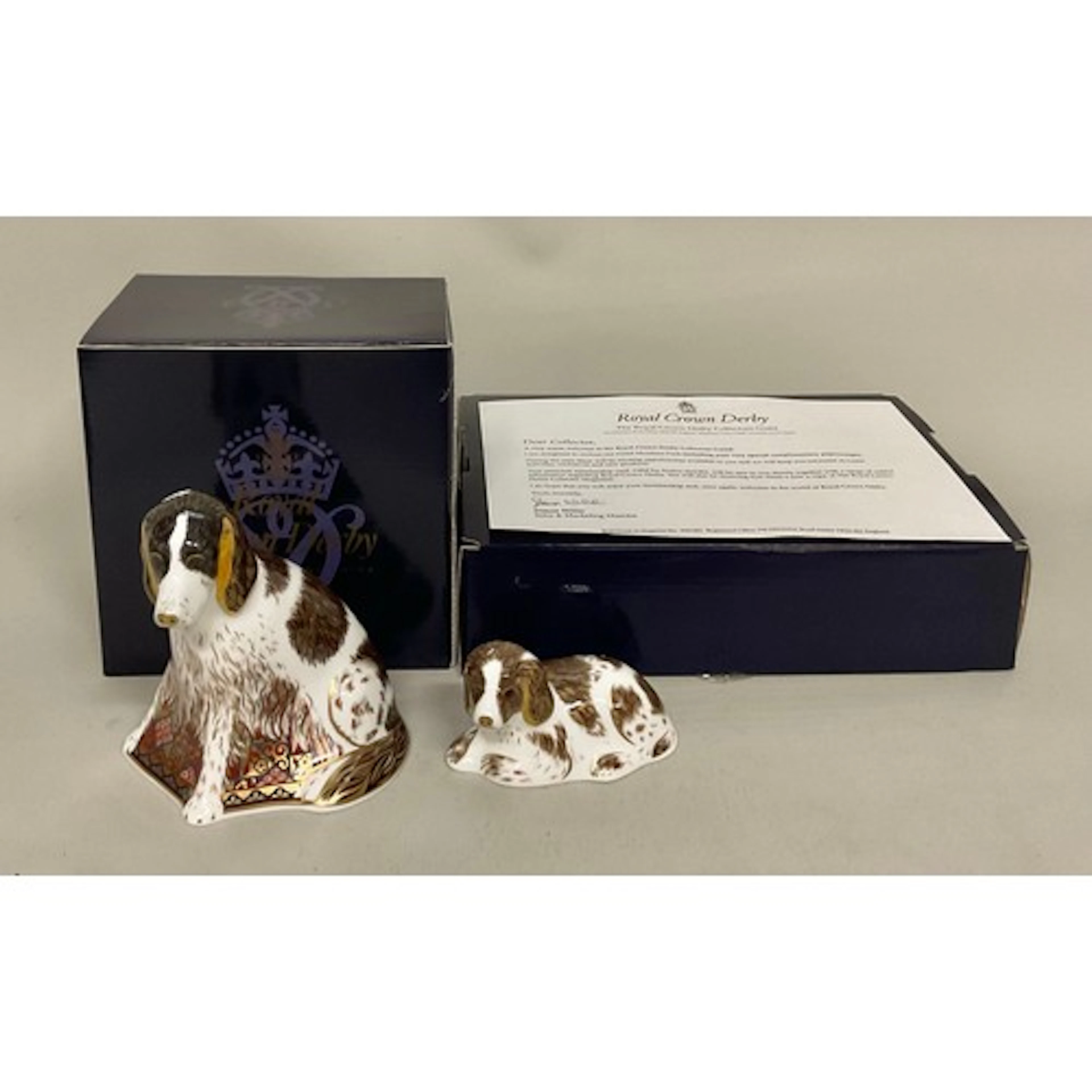 A pair of Royal Crown Derby paperweights, comprising Molly M...
