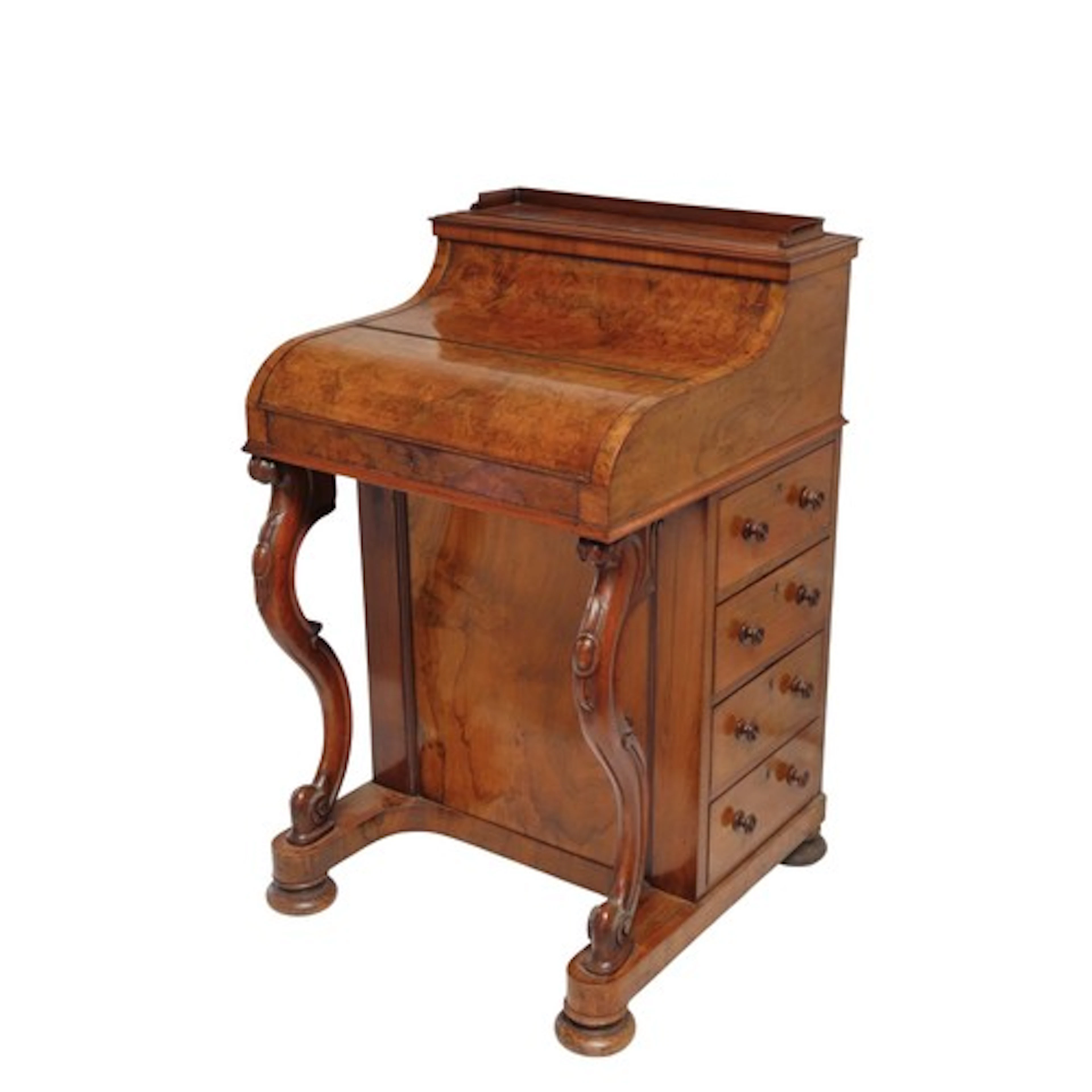 A MID VICTORIAN BURR WALNUT DAVENPORT CIRCA 1860 the piano f...