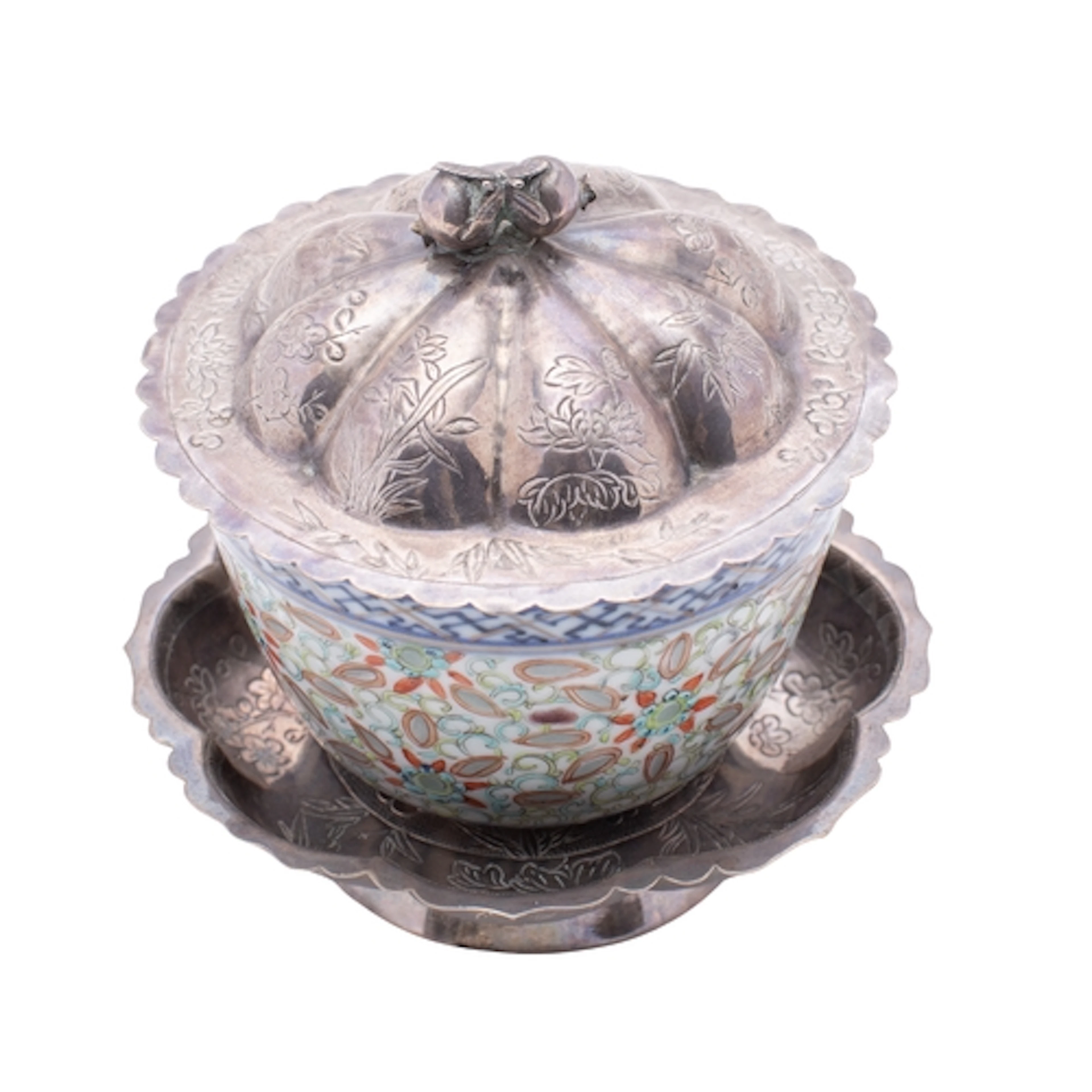 A Chinese silver-mounted porcelain 'rice grain' cup, late Qi...
