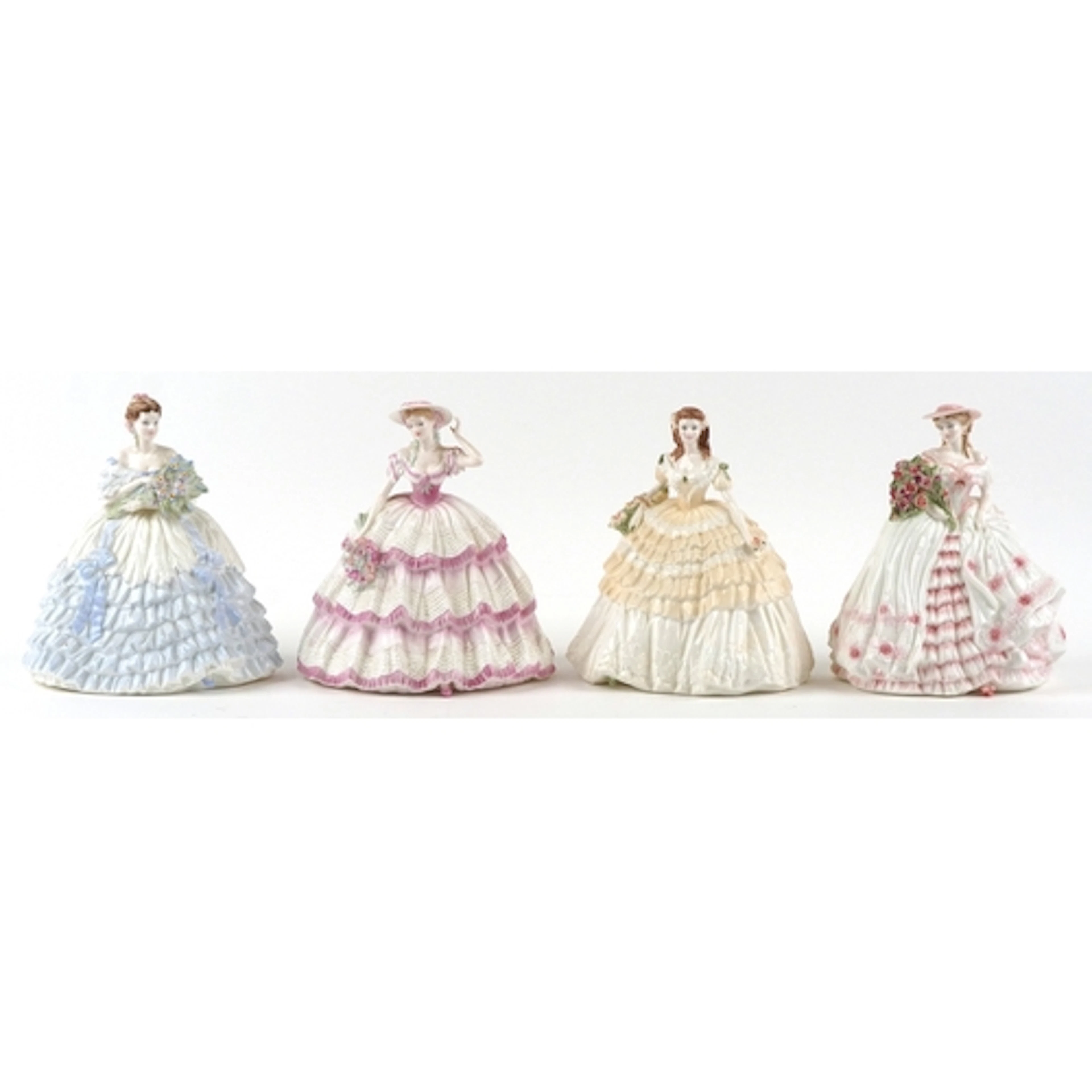 Four Coalport figurines from the Four Flowers Collection inc...