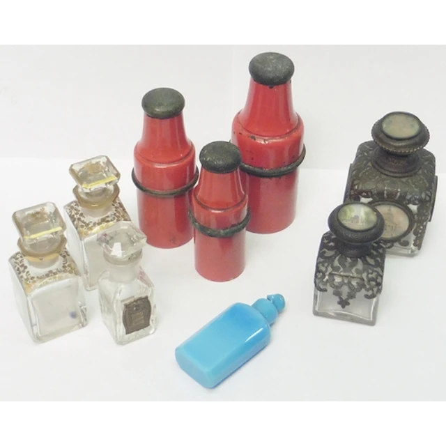 A collection of scent bottles incl two base metal cased cont...