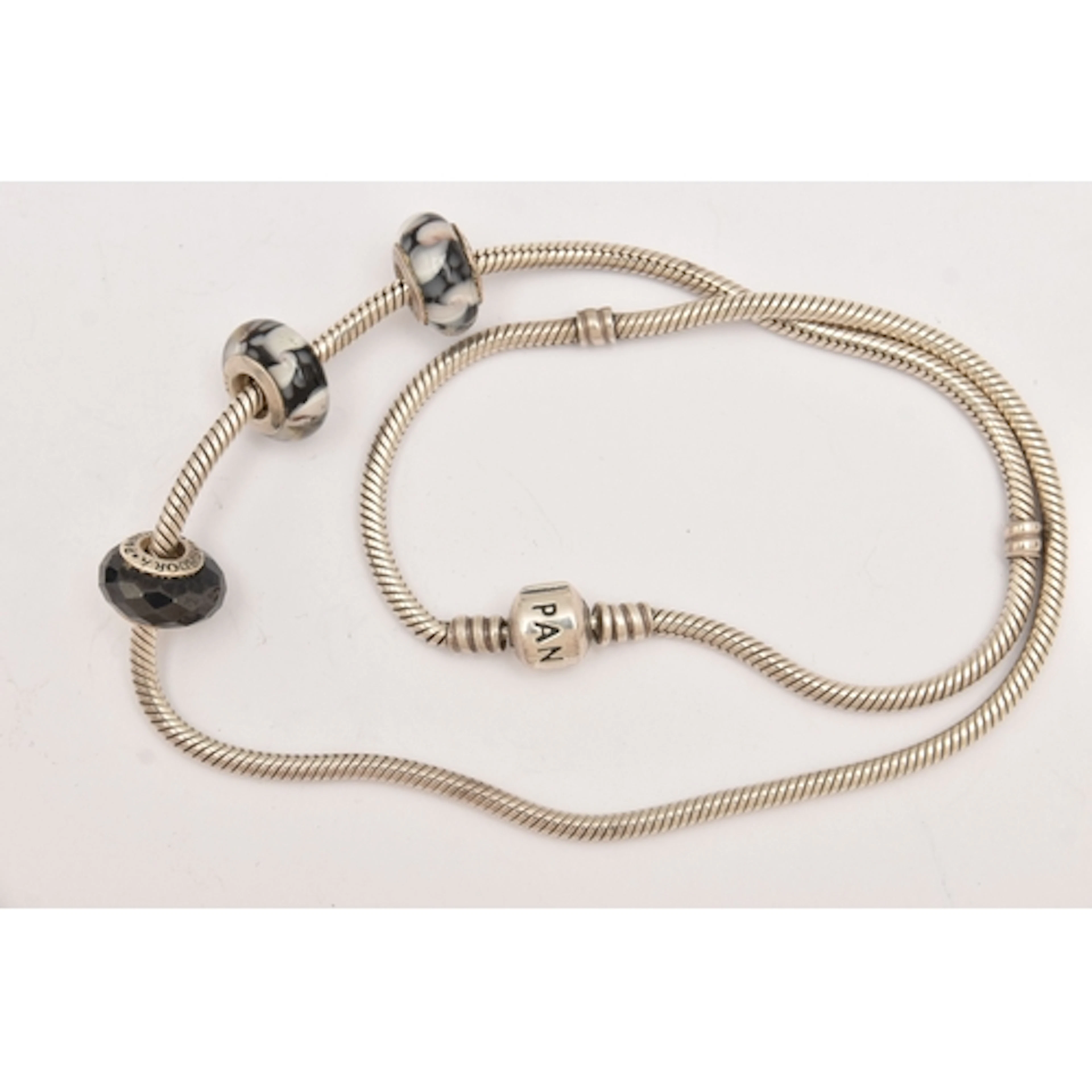 A 'PANDORA' CHARM CHAIN NECKLACE, snake chain, with three sc...