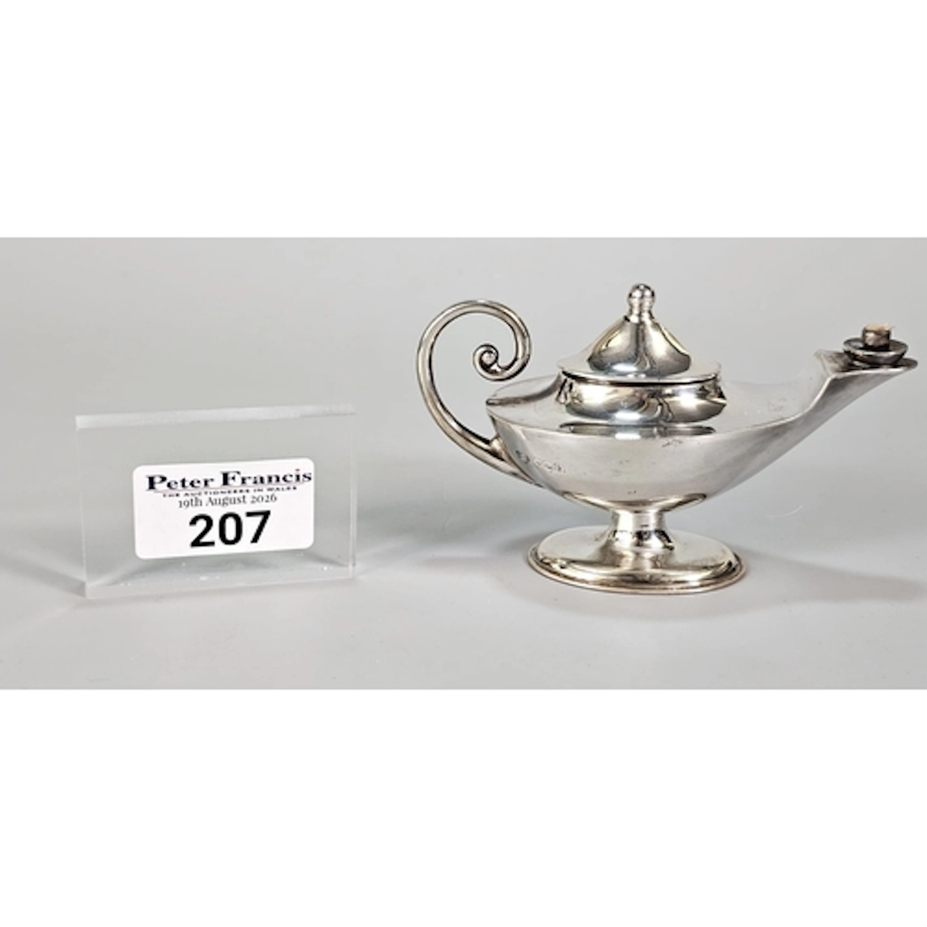 George V novelty silver table lighter in the style of Aladdi...
