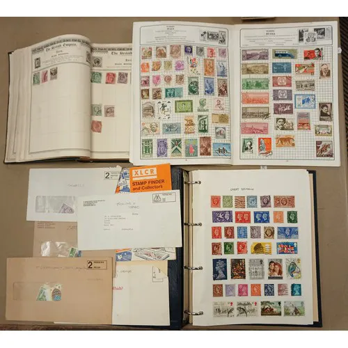 Empire postage stamp album, containing various Empire stamps...