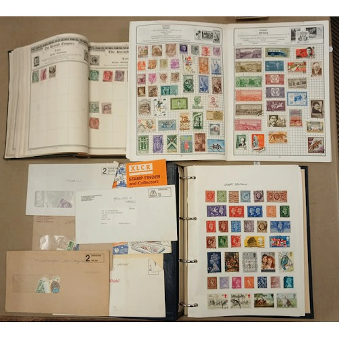 Empire postage stamp album, containing various Empire stamps...