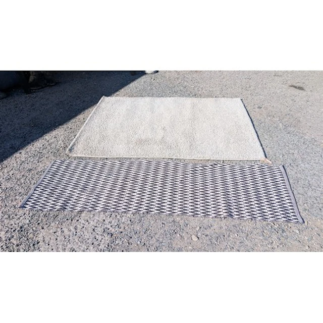 Black and white chevron-patterned runner rug; together with ...
