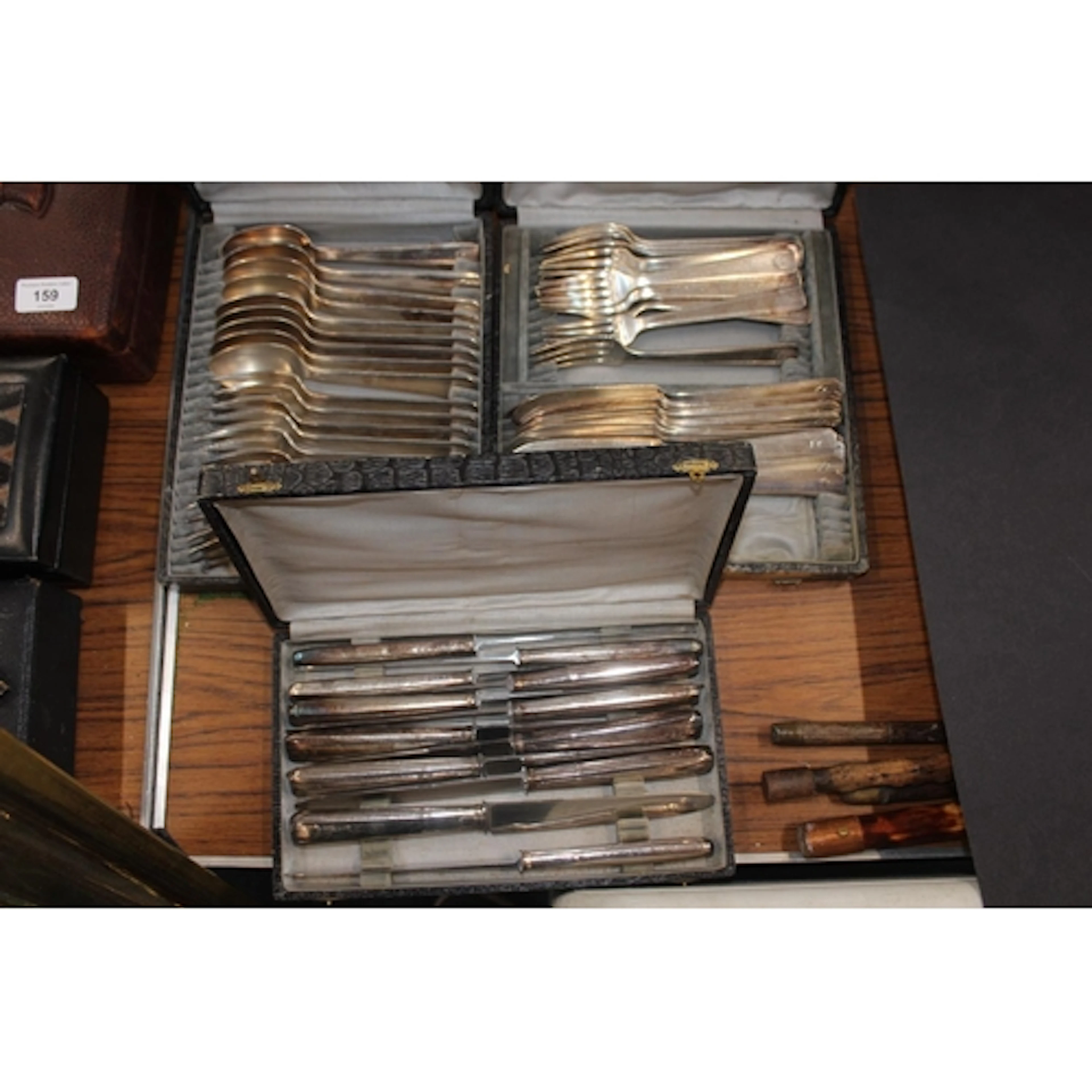 Four cased sets of matching cutlery in the Art Deco style, m...