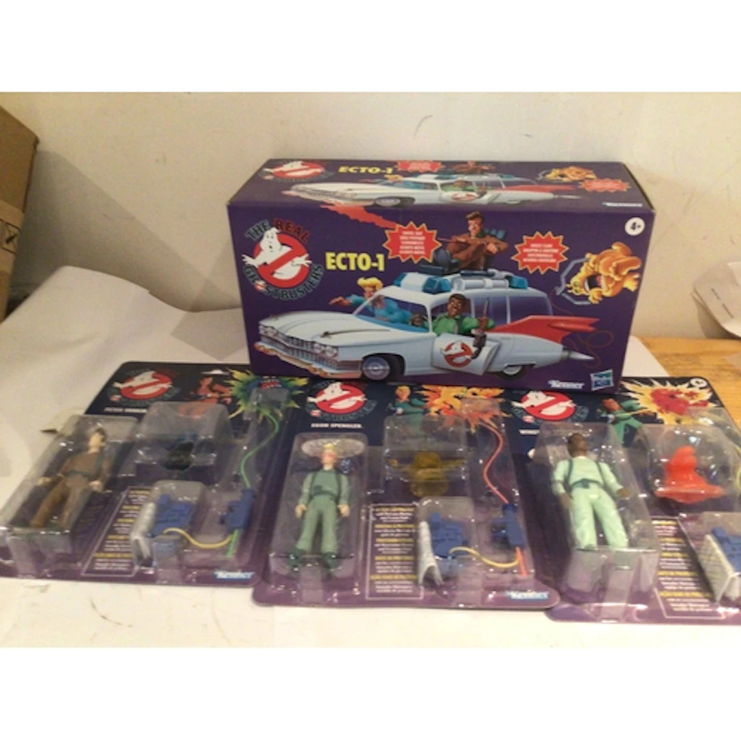 A collection of Ghostbusters figures including Action figure...