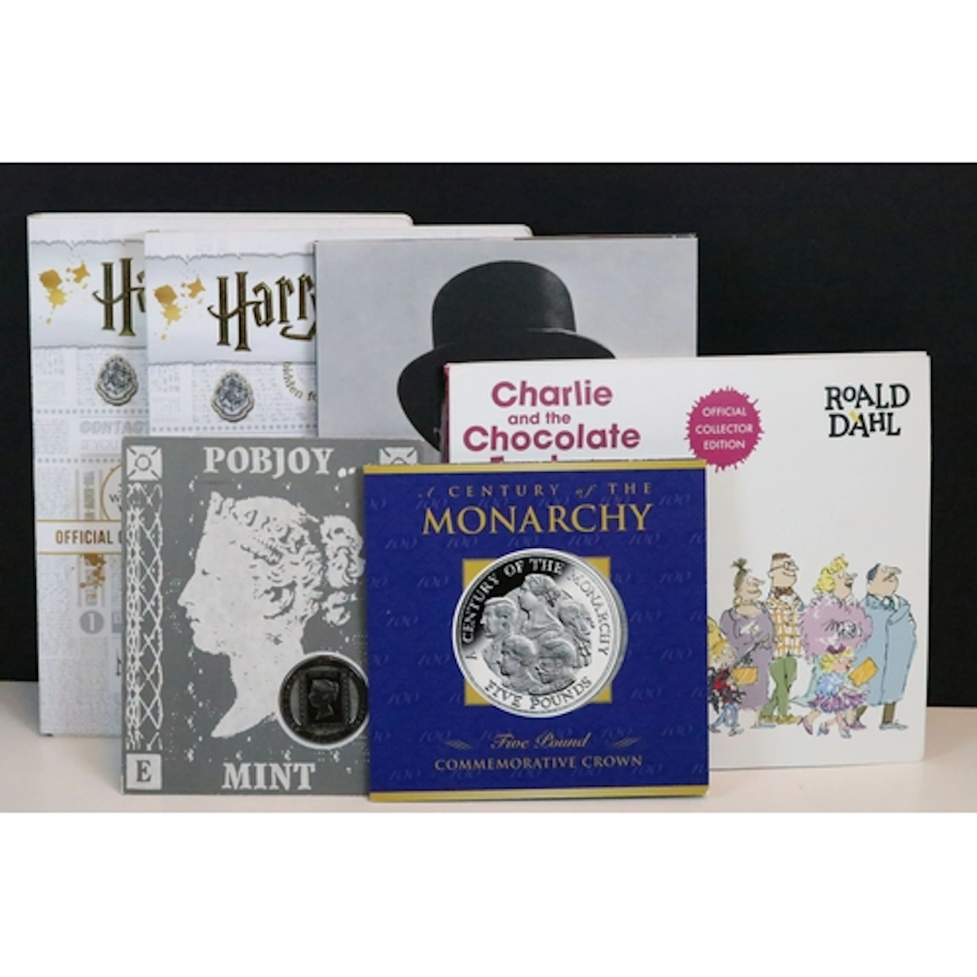 A group of uncirculated collectors coins and medallions with...