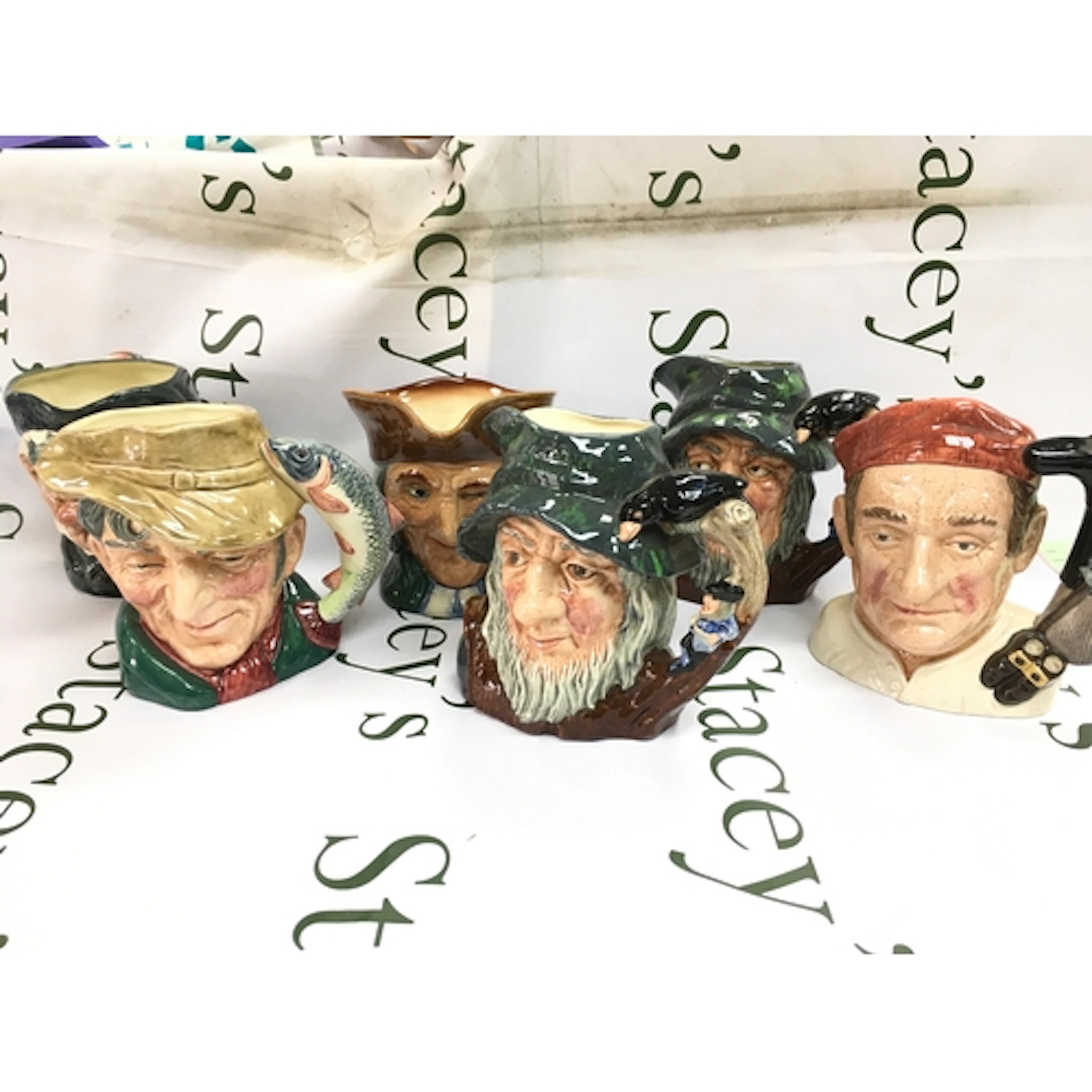 Six Royal Doulton character jugs including Rip Van Winkle, B...